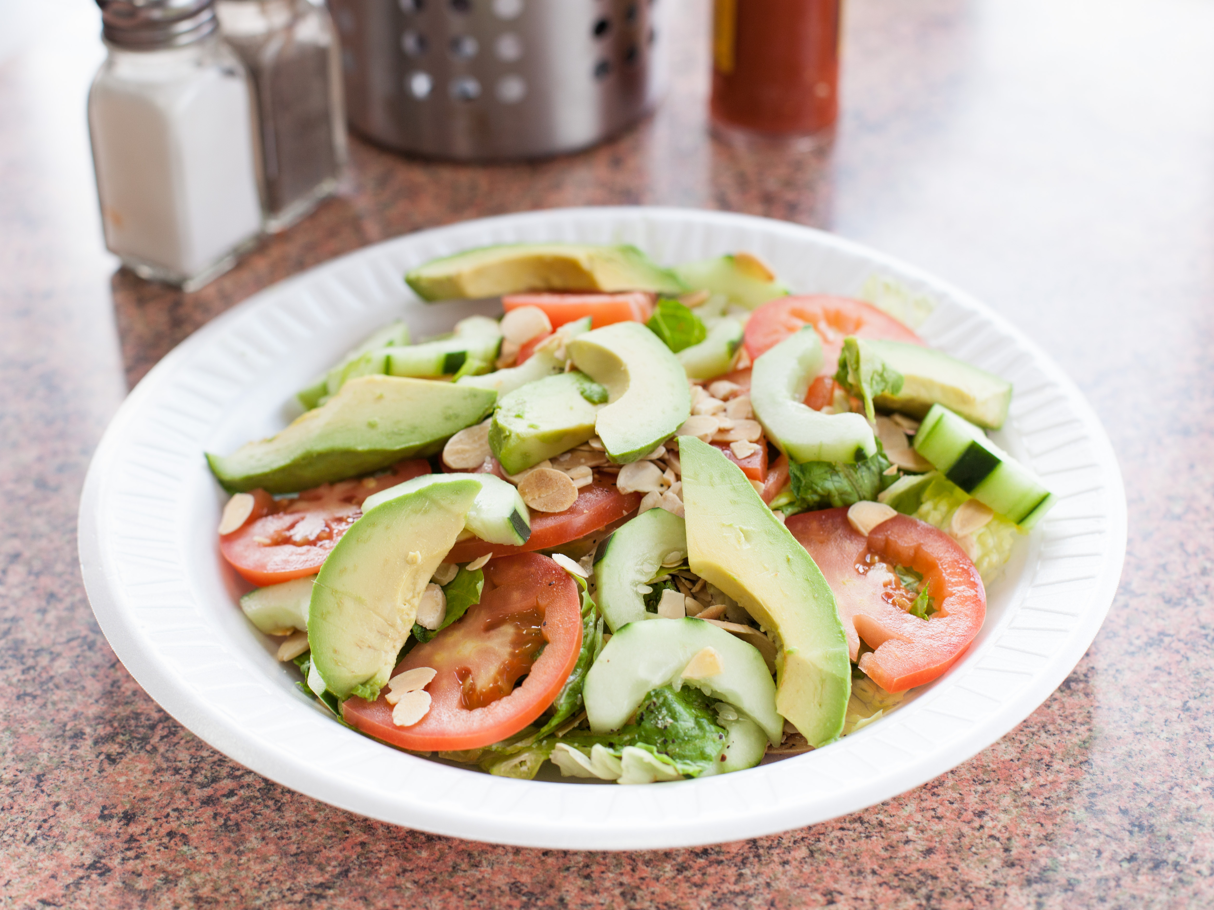 Order Avocado Almond Salad food online from Taste Cafe & Grill store, Ozone Park on bringmethat.com