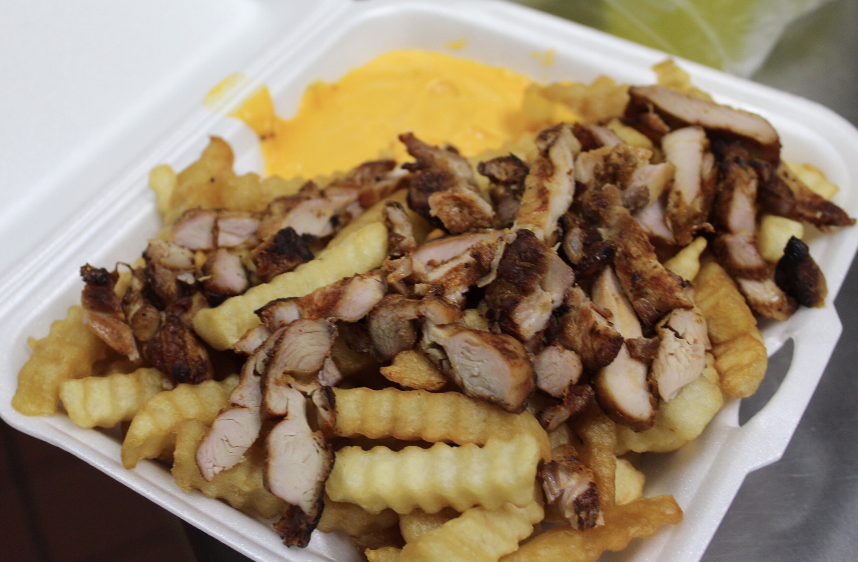 Order 79. French Fries with Grilled Chicken and Cheese food online from Yummy Taco store, Inwood on bringmethat.com