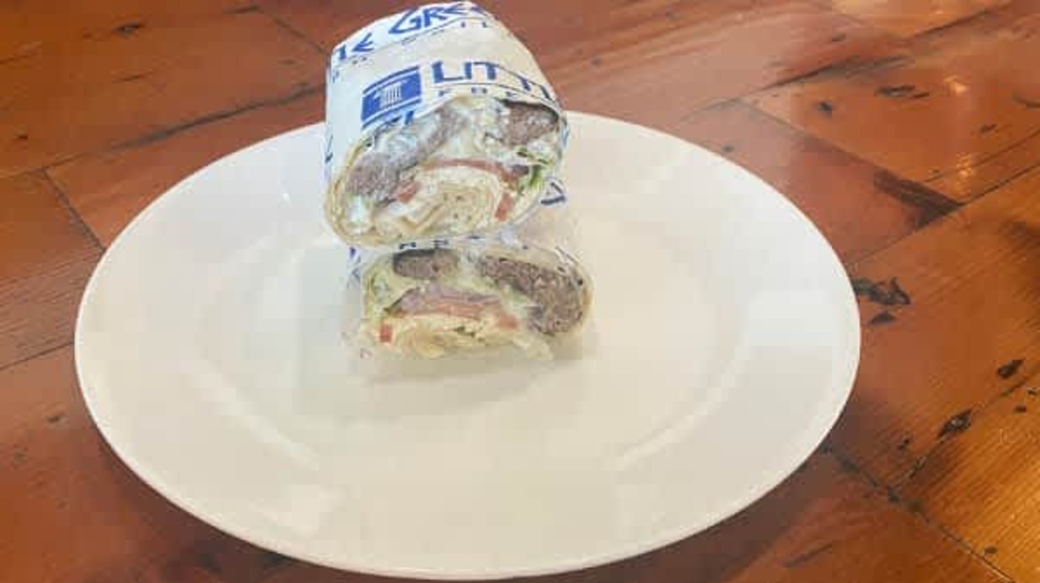 Order PITA BURGER WRAP food online from Little Greek Fresh Grill store, Youngstown on bringmethat.com
