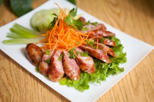 Order 39. Lao Style Sausage food online from Thai Wok-In & Go store, Dallas on bringmethat.com