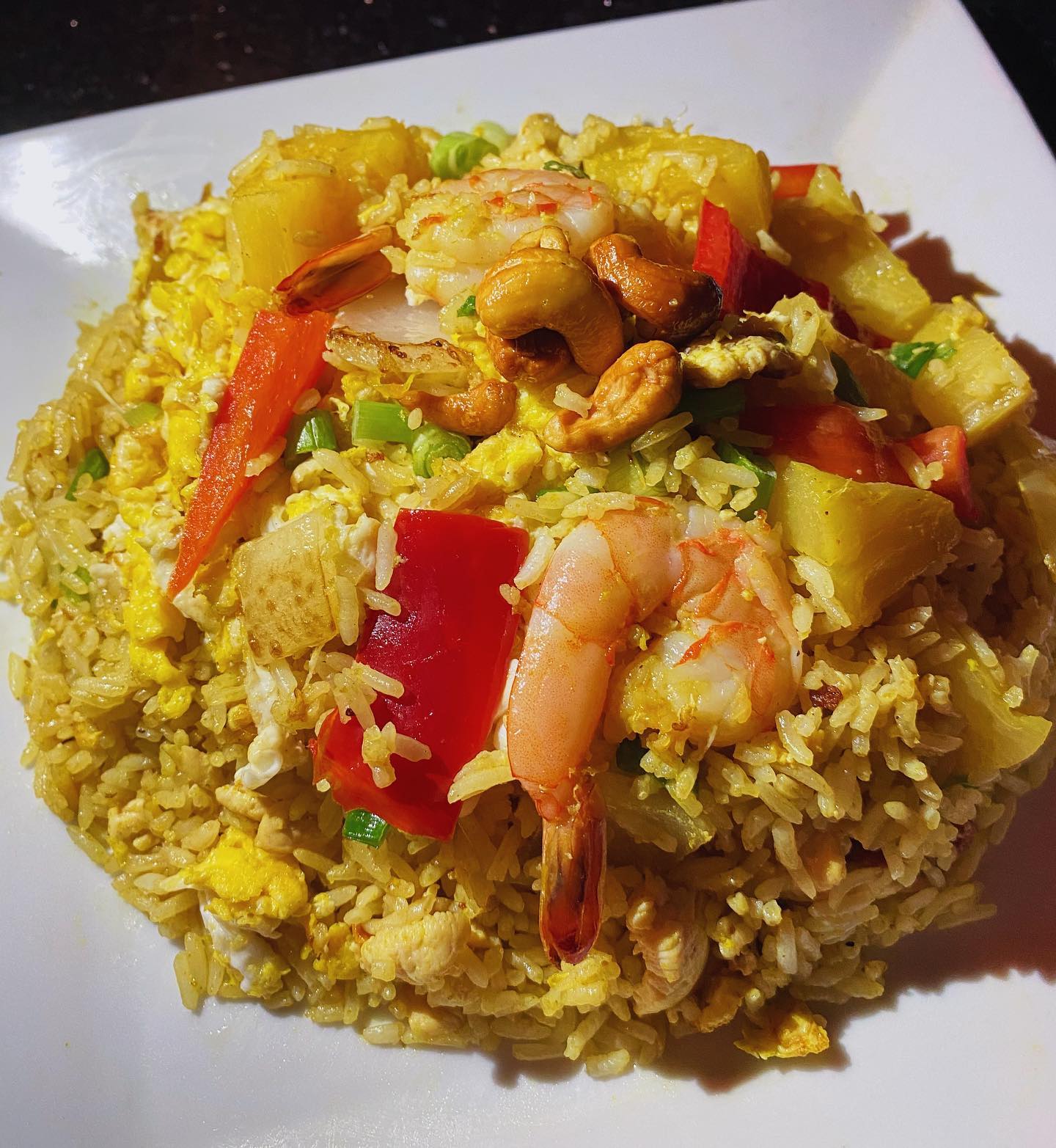 Order Pineapple Fried Rice food online from Wanya Thai Restaurant store, Canyon Country on bringmethat.com