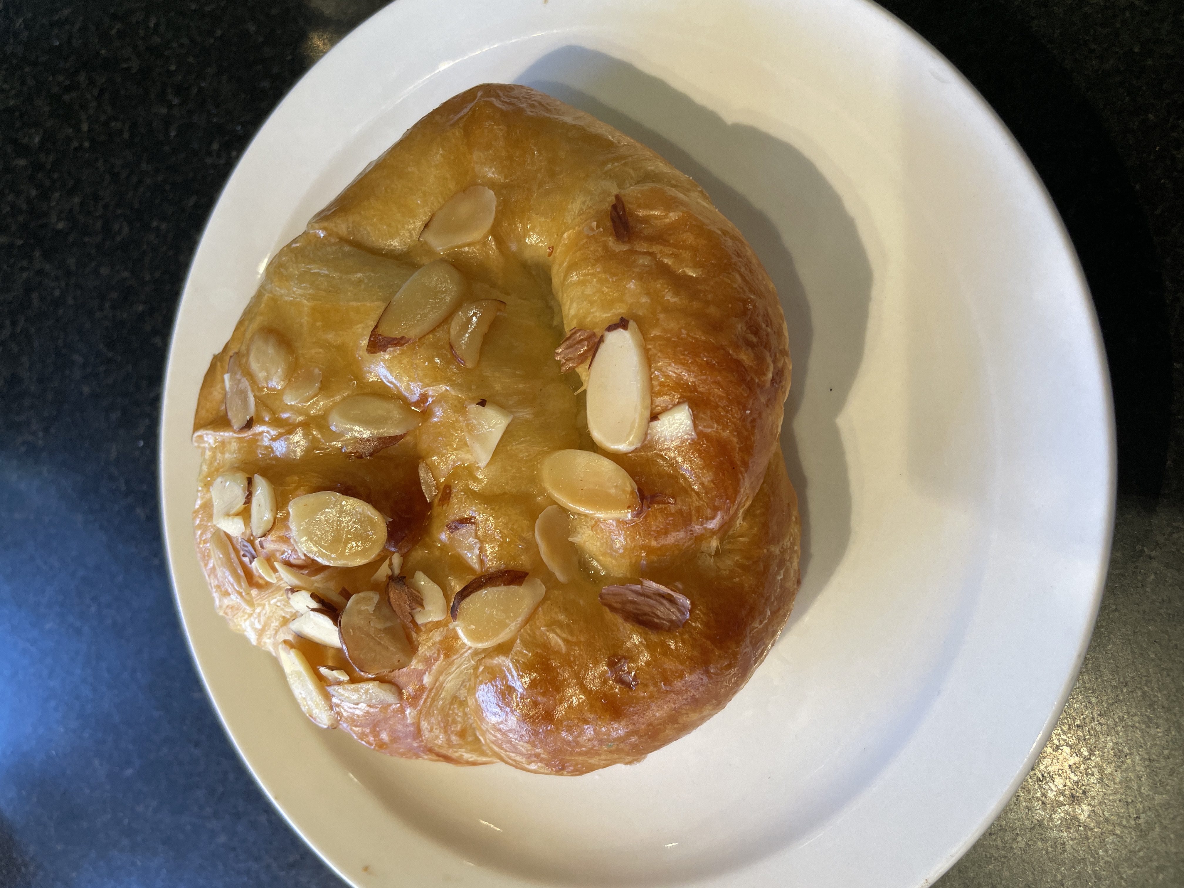Order Almond Croissant  food online from Ike Coffee & Tea store, Tucson on bringmethat.com