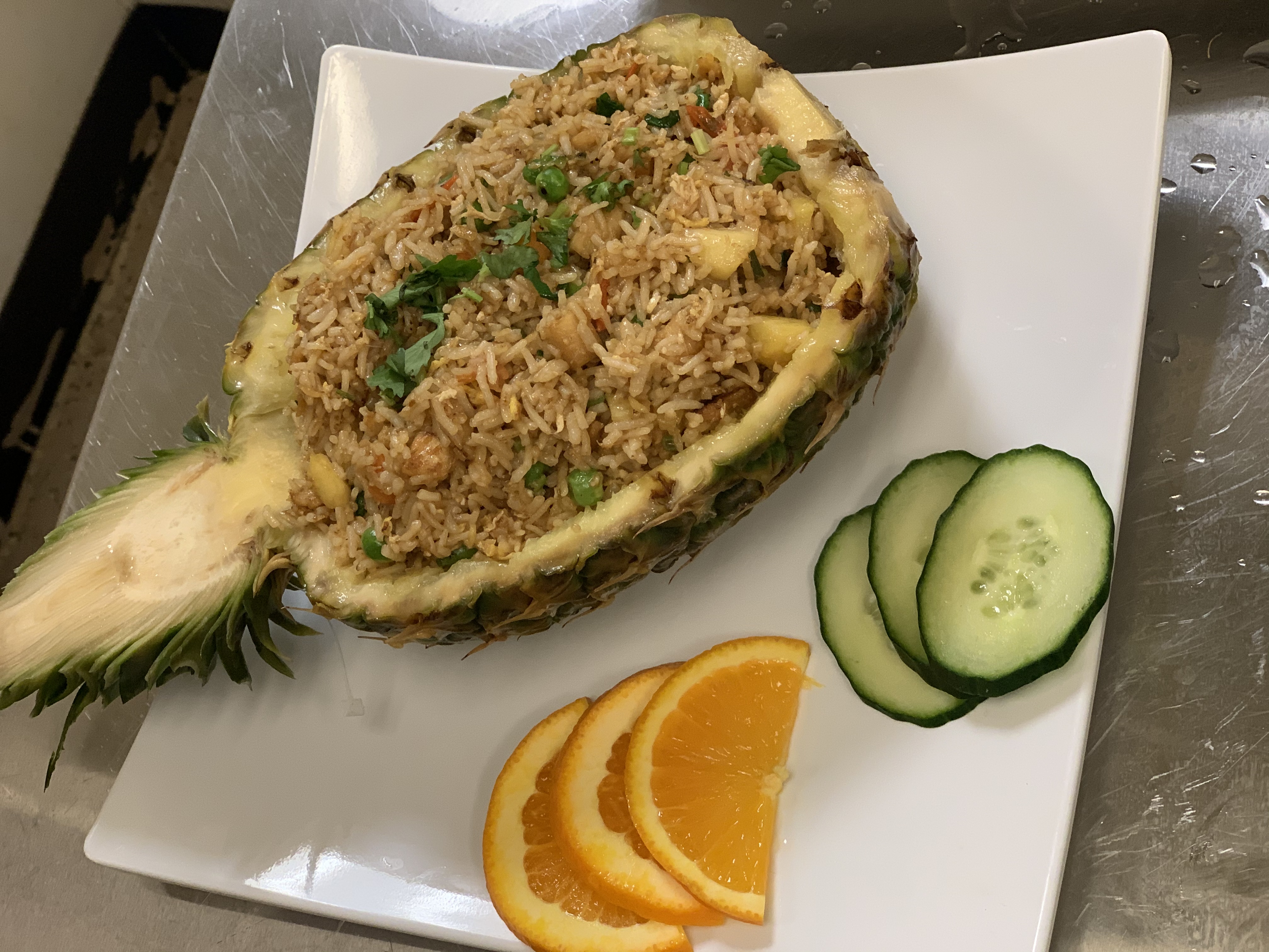 Order 64. Pineapple Fried Rice food online from Kissaten Restaurant store, Indianapolis on bringmethat.com