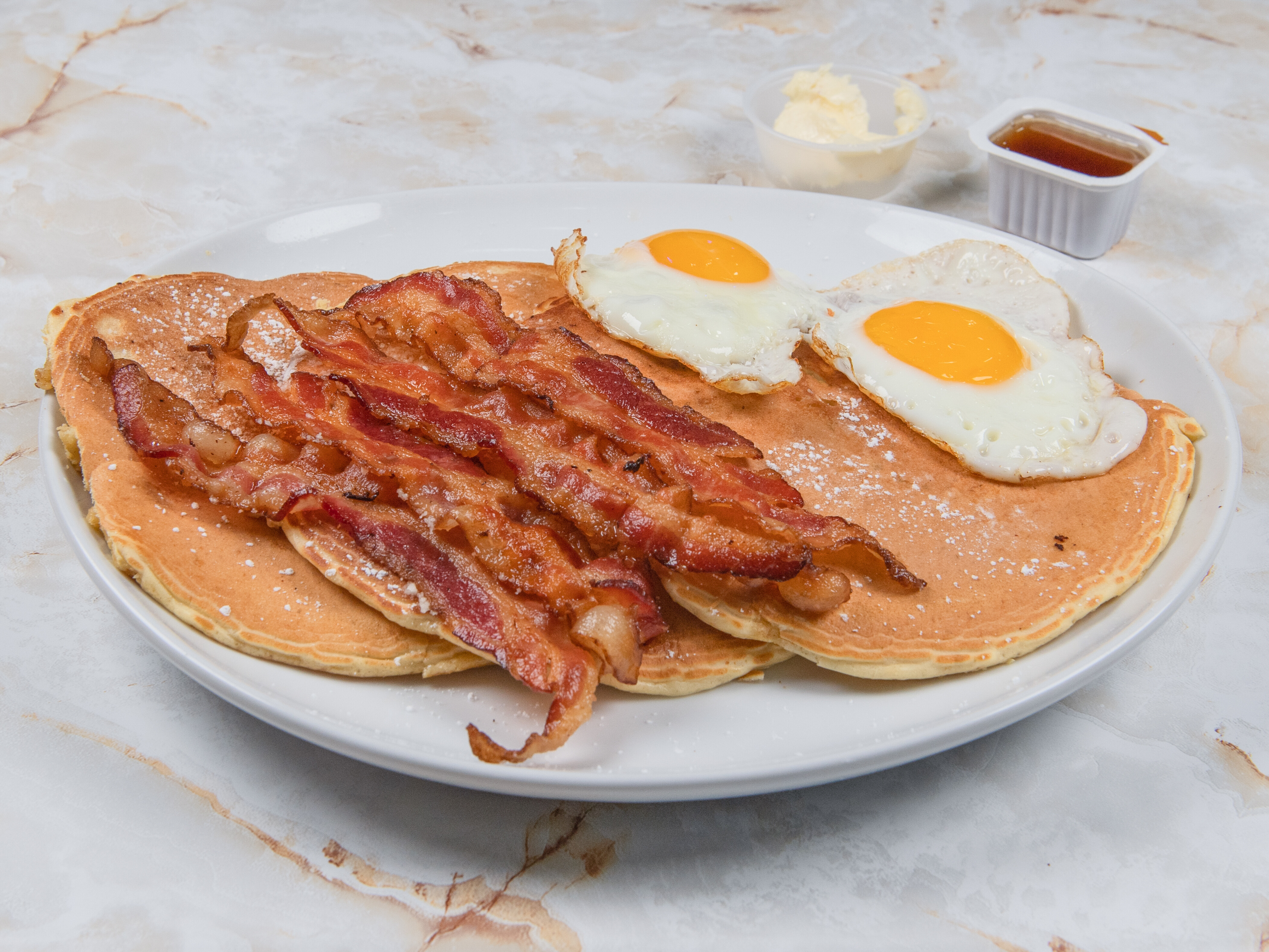 Order Buttermilk Pancake with Eggs food online from Tulcingo Cafe & Deli store, Bronx on bringmethat.com