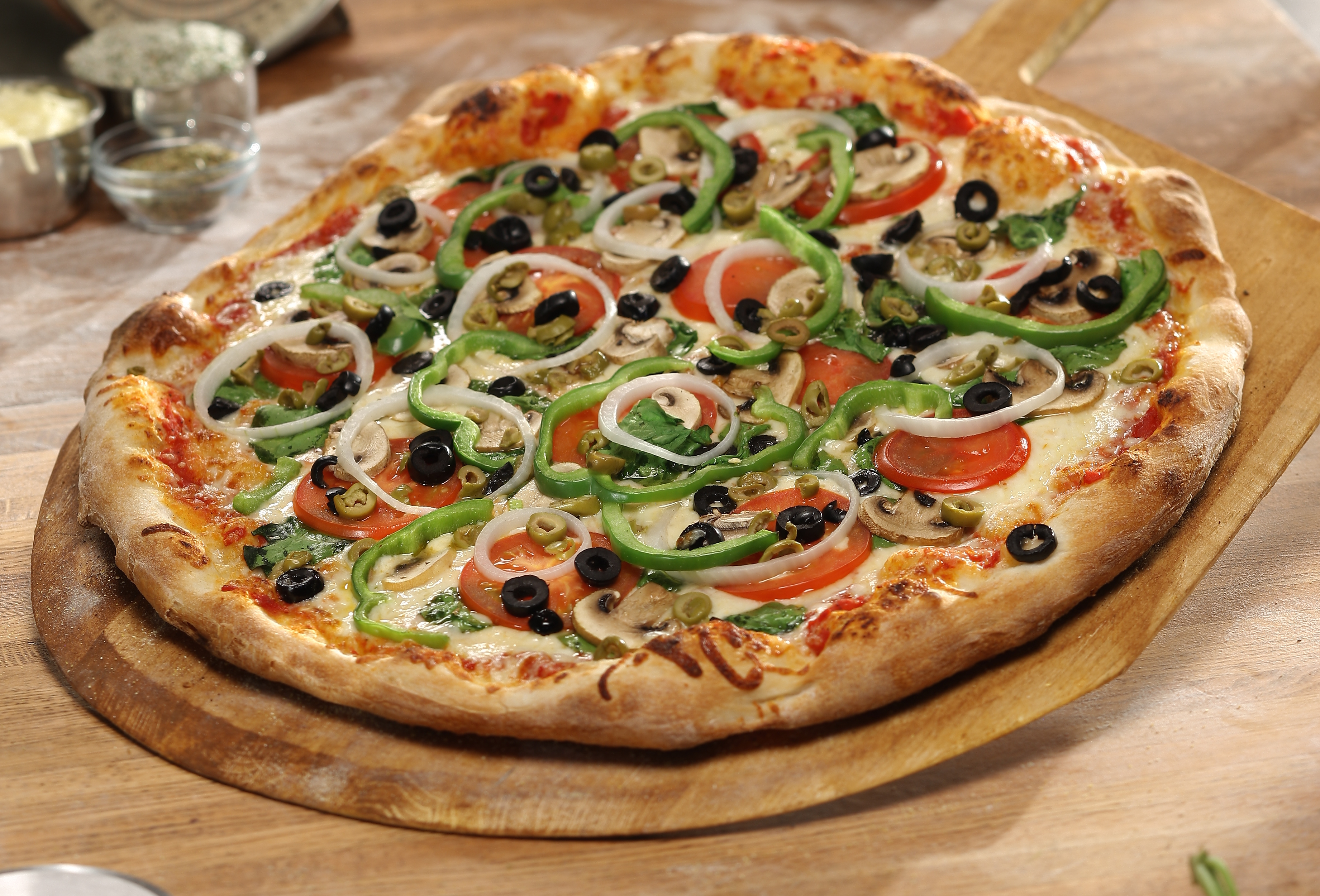 Order Traditional Deluxe Pizza food online from Town center pizzeria store, Virginia Beach on bringmethat.com