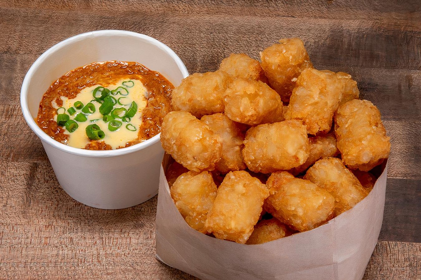 Order CHILI CHEESE TOTS food online from Bad Mutha Clucka store, Thousand Oaks on bringmethat.com