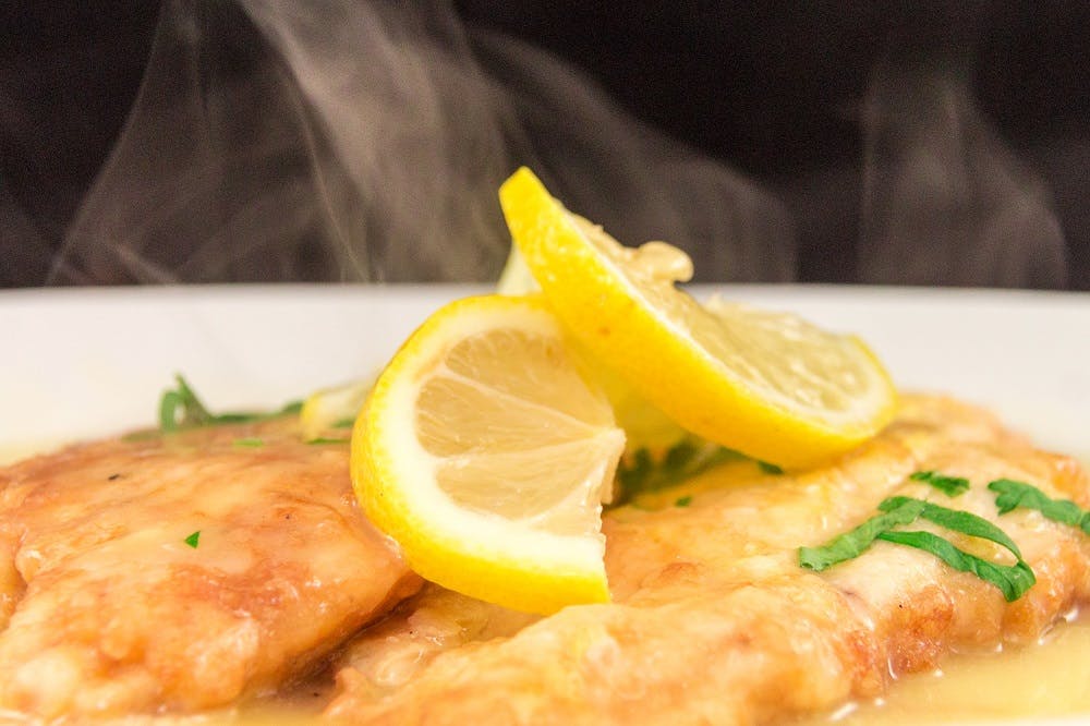 Order Chicken Francese - Entree food online from The Godfather Of East Hanover store, East Hanover on bringmethat.com