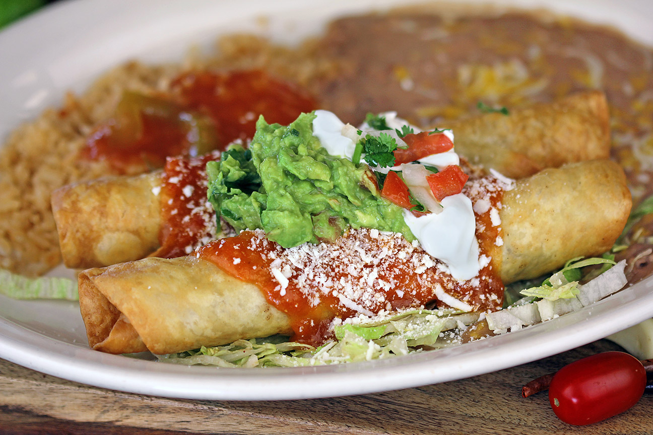 Order 21. Two Flautas Combo food online from Maria Mexican Restaurant store, Rancho Palos Verdes on bringmethat.com