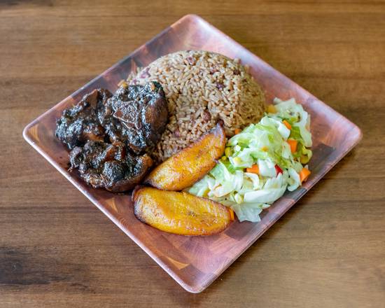 Order Oxtails food online from Calabash Caribbean Grill store, St. Andrews on bringmethat.com
