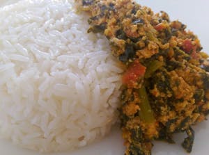 Order White Rice With Egusi food online from Loves Kitchen store, Roswell on bringmethat.com