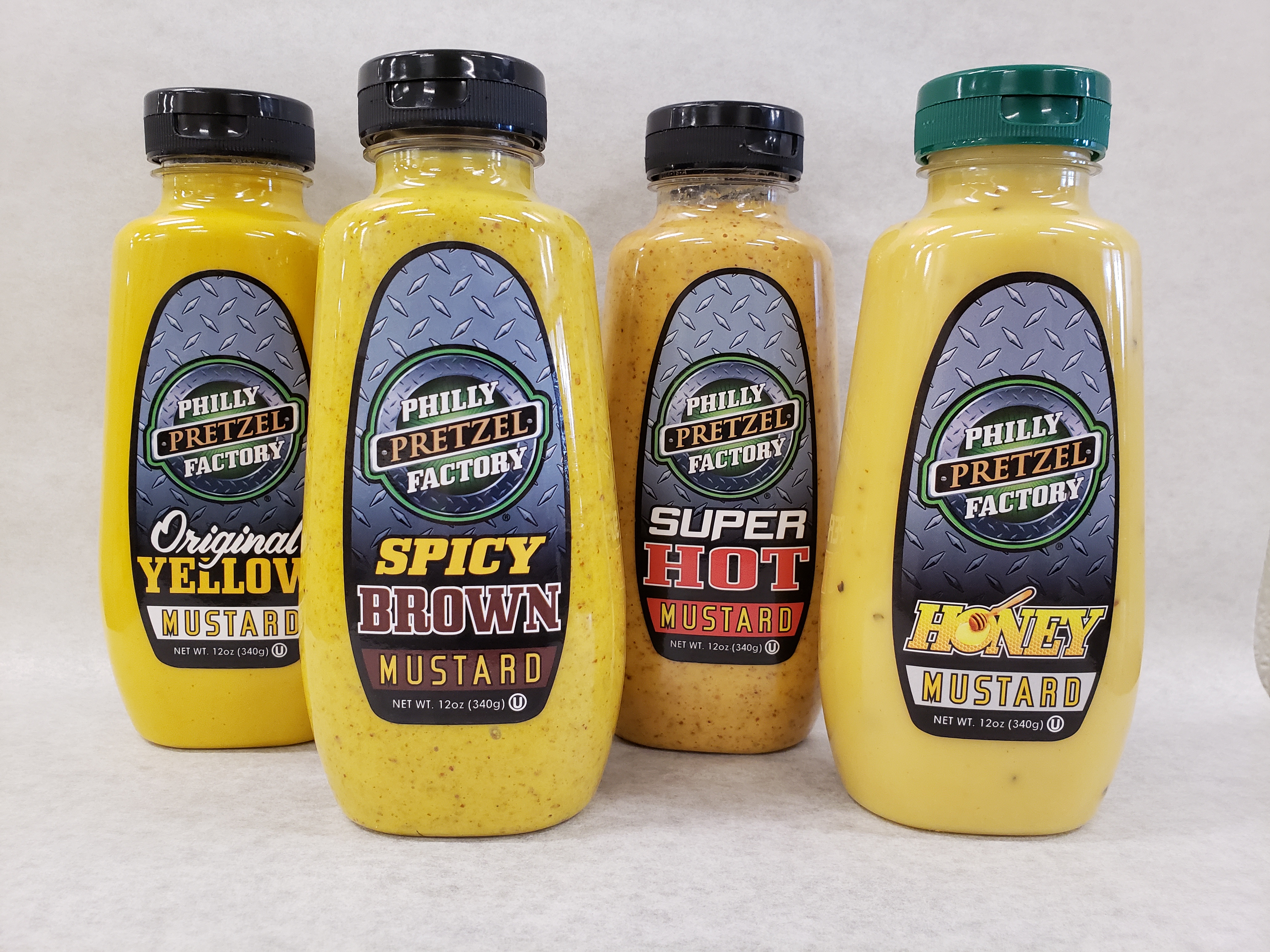 Order Yellow Mustard Bottle food online from Philly Pretzel Factory store, Springfield on bringmethat.com