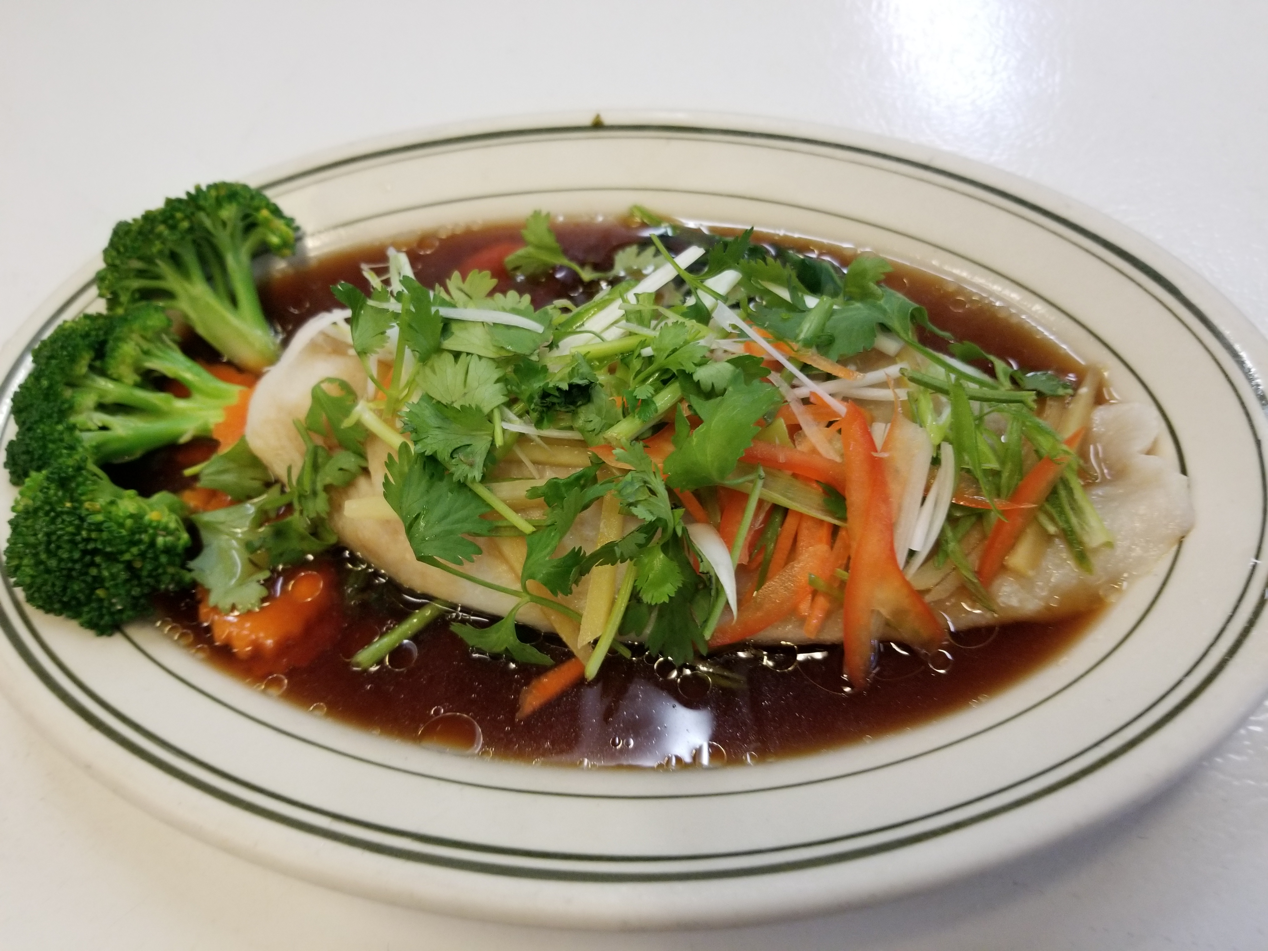 Order S1. Steam Fish food online from At Bangkok store, Los Angeles on bringmethat.com