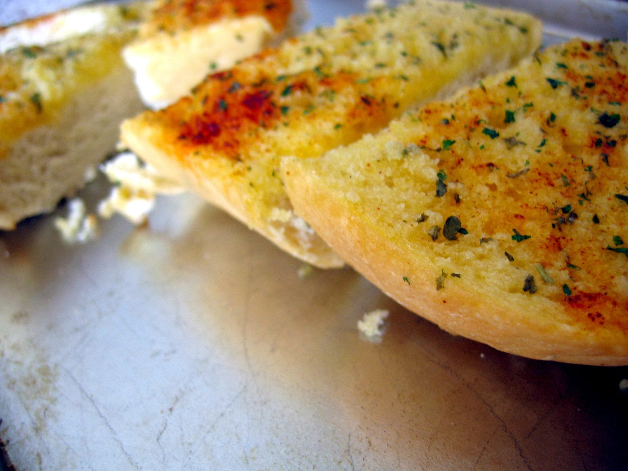 Order Garlic Bread - Appetizer food online from Freds Pizza & Italian Restaurant store, Grand Rapids on bringmethat.com
