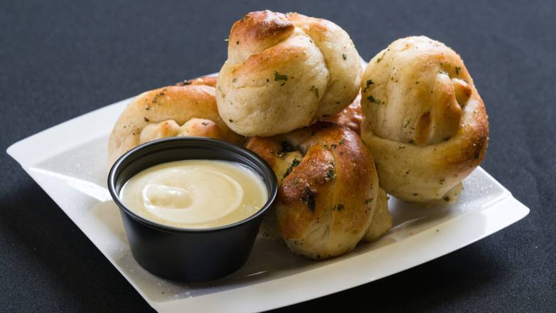 Order Garlic Knots with Cheese and Sauce food online from Sea Creations Bistro store, Westbury on bringmethat.com