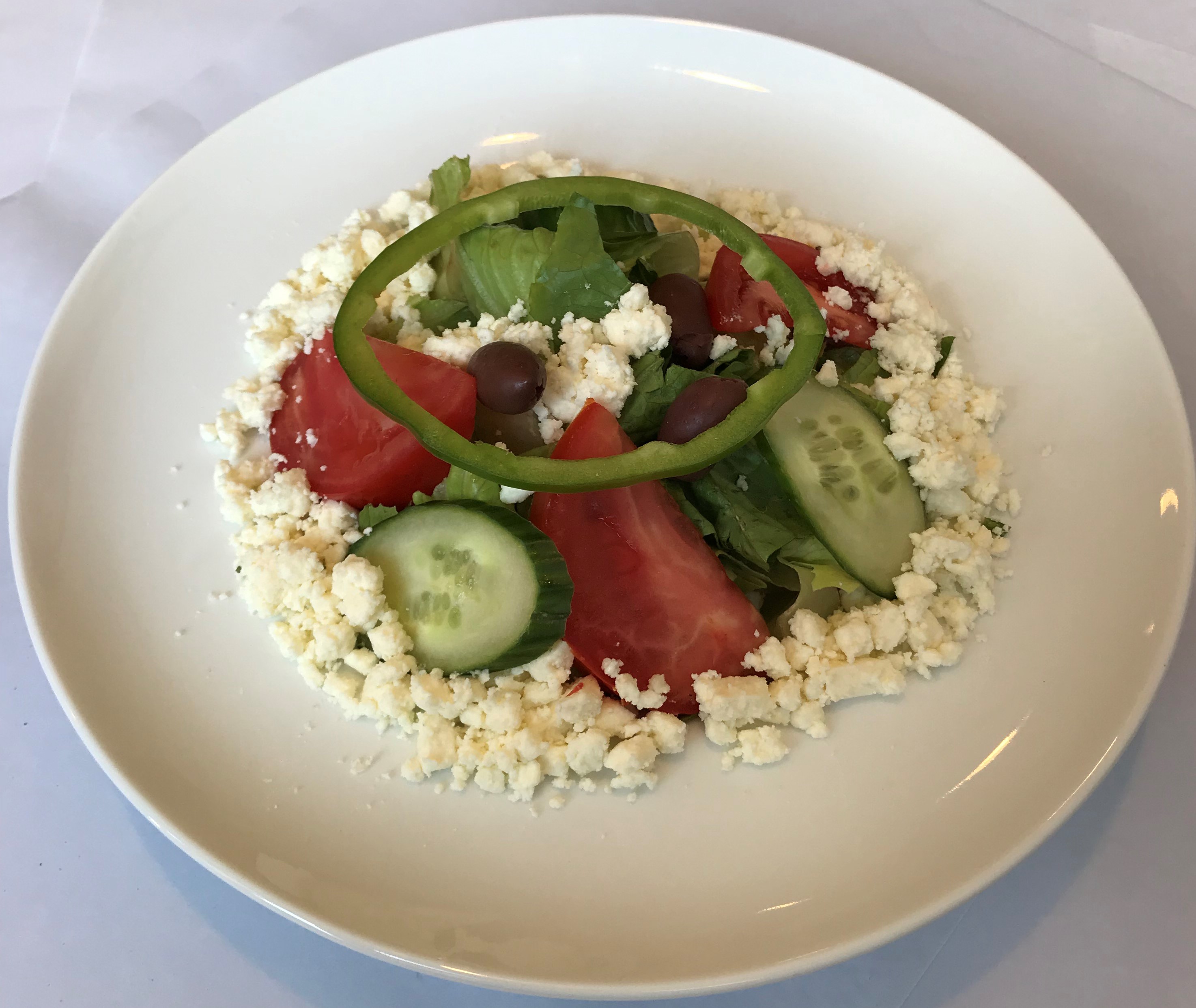 Order Greek Salad food online from Noor Mediterranean Grill store, Somerville on bringmethat.com
