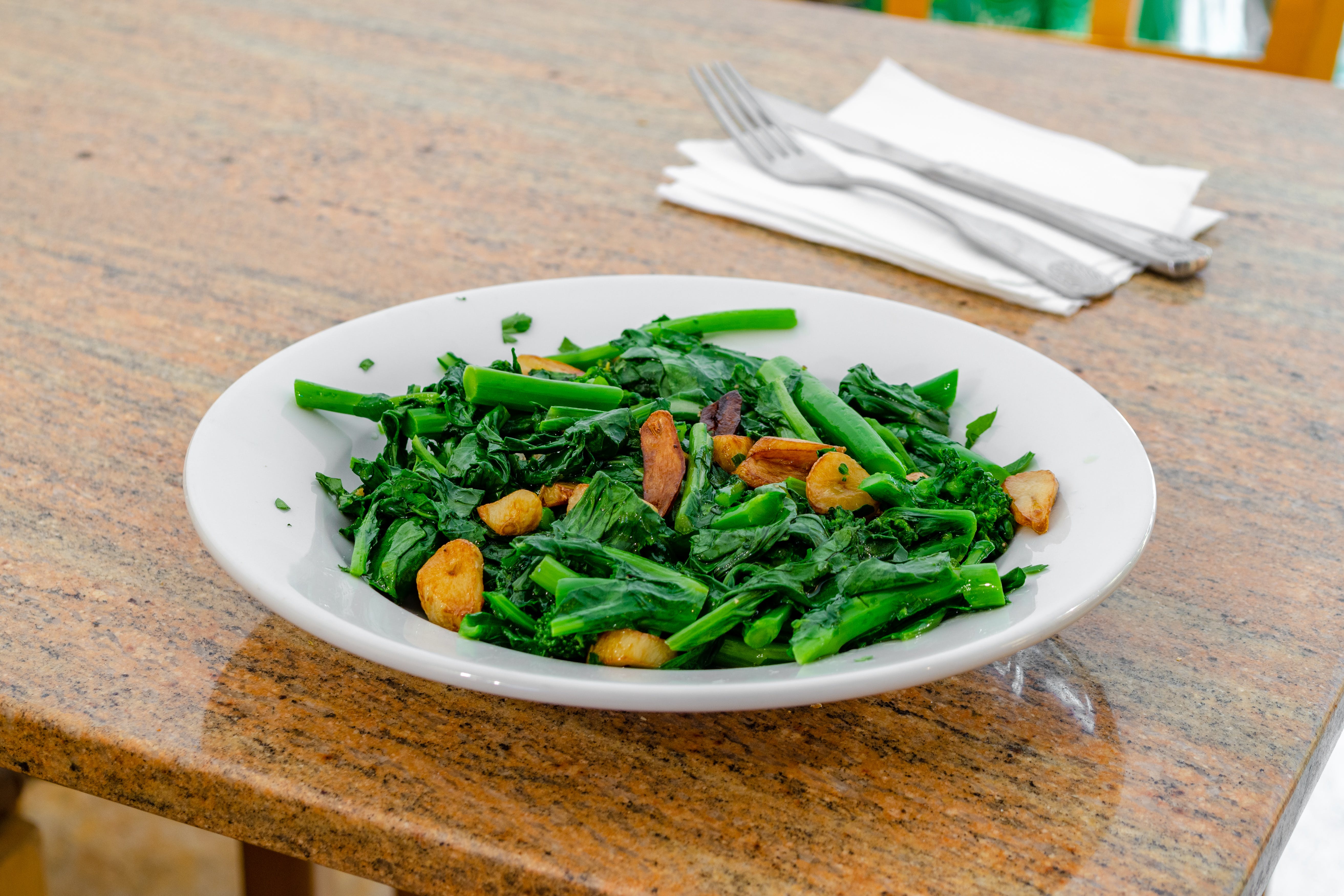 Order Side of Sauteed Broccoli Rabe - Side food online from Regina Pizza store, Lynbrook on bringmethat.com