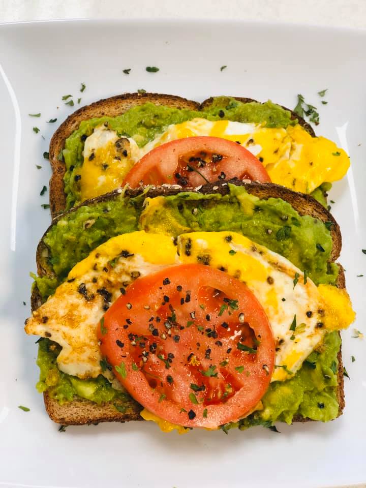 Order Avocado Toast Topped with a Tomato & Egg food online from Crave Bakery And Bar store, Chesapeake on bringmethat.com