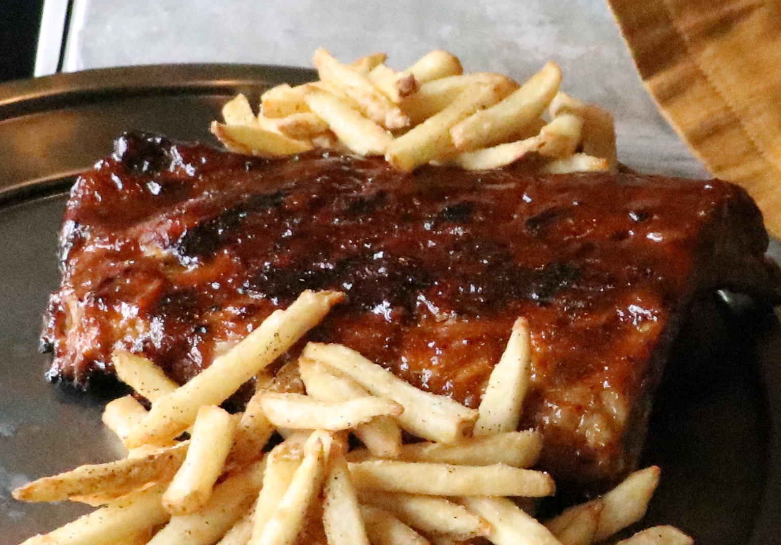 Order Bourbon-Glazed Baby Back Ribs food online from Scotty's brewhouse store, Bloomington on bringmethat.com