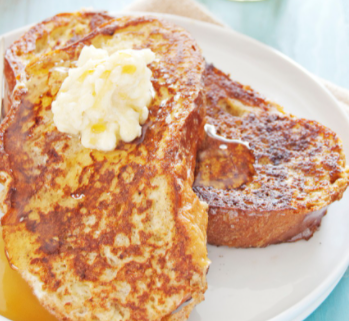 Order One French Toast food online from Janik's Cafe store, Chicago on bringmethat.com