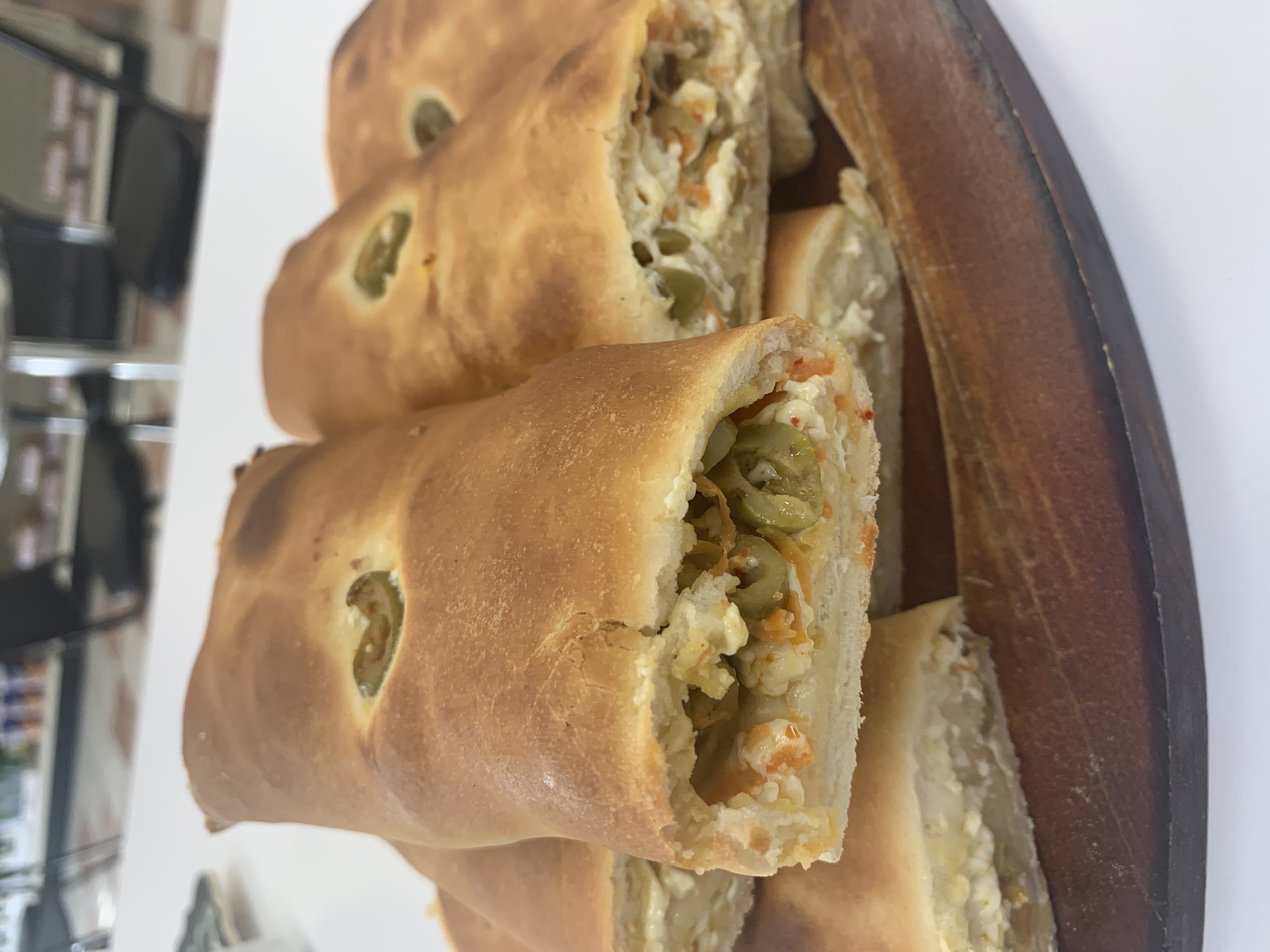 Order Green olives and cheese Burek / Bread  food online from Zaatar Factory Bakery store, Burbank on bringmethat.com