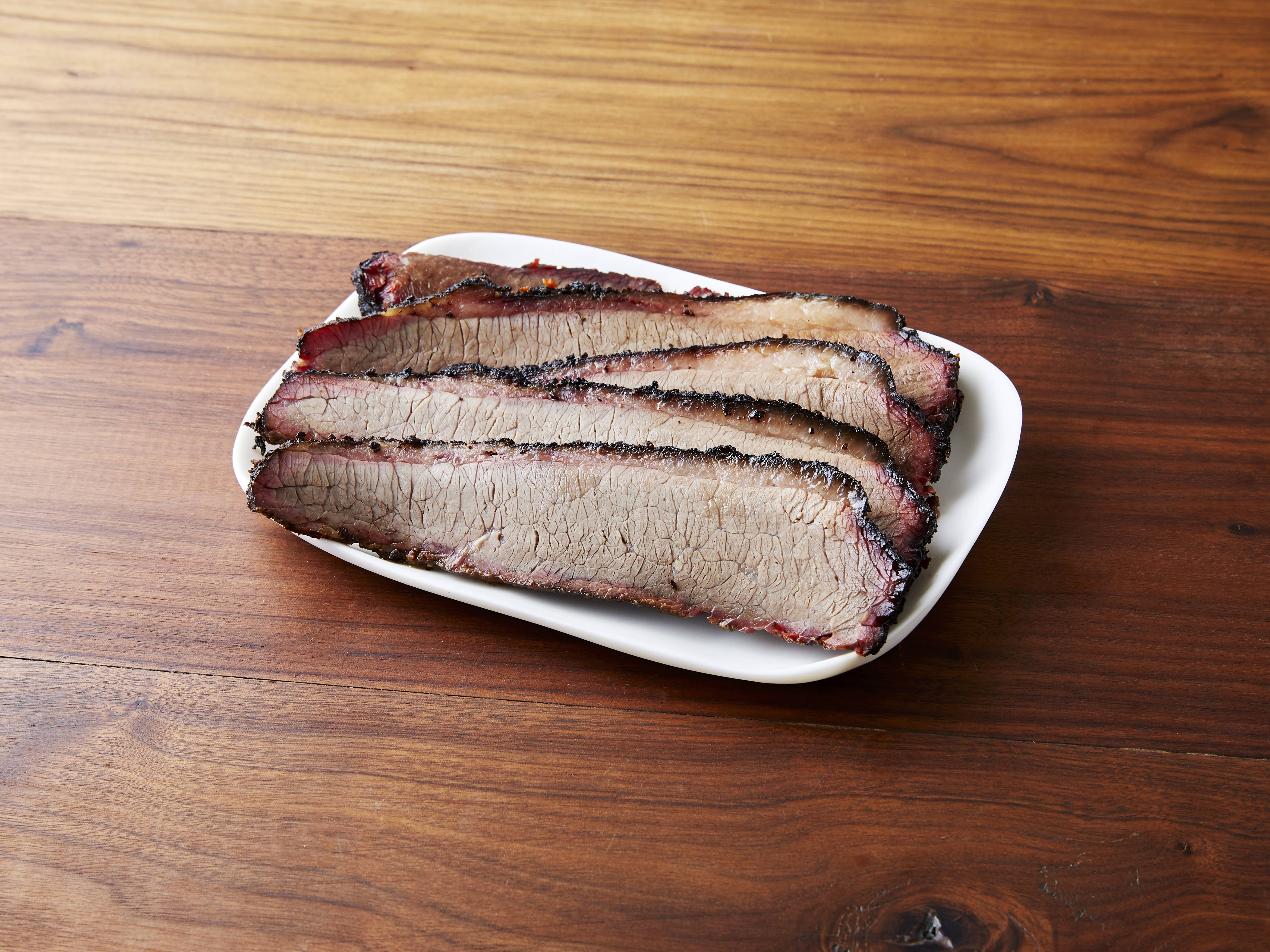 Order 1/2 lb. Central Texas Beef Brisket food online from Woodpile Bbq Shack store, Clawson on bringmethat.com
