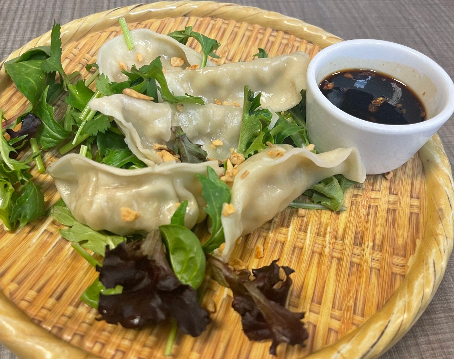 Order Gyoza food online from Saucy's Thai & Pho store, Plano on bringmethat.com