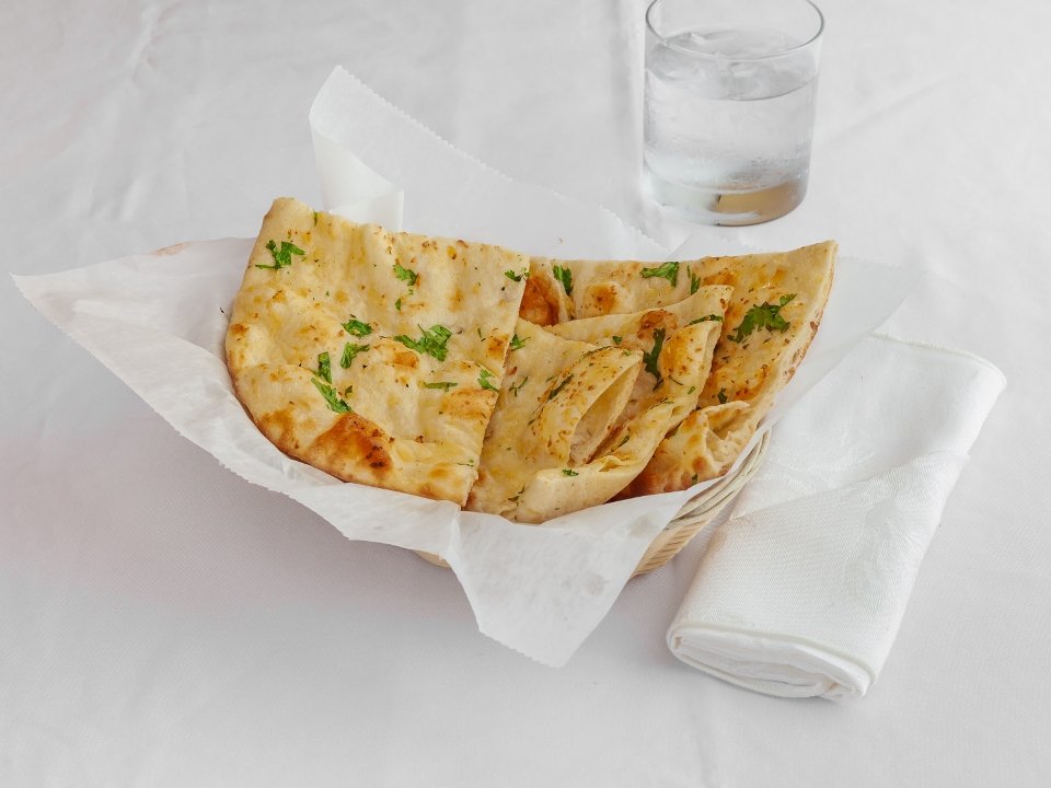 Order Garlic Naan food online from Namaste Chicago store, Chicago on bringmethat.com