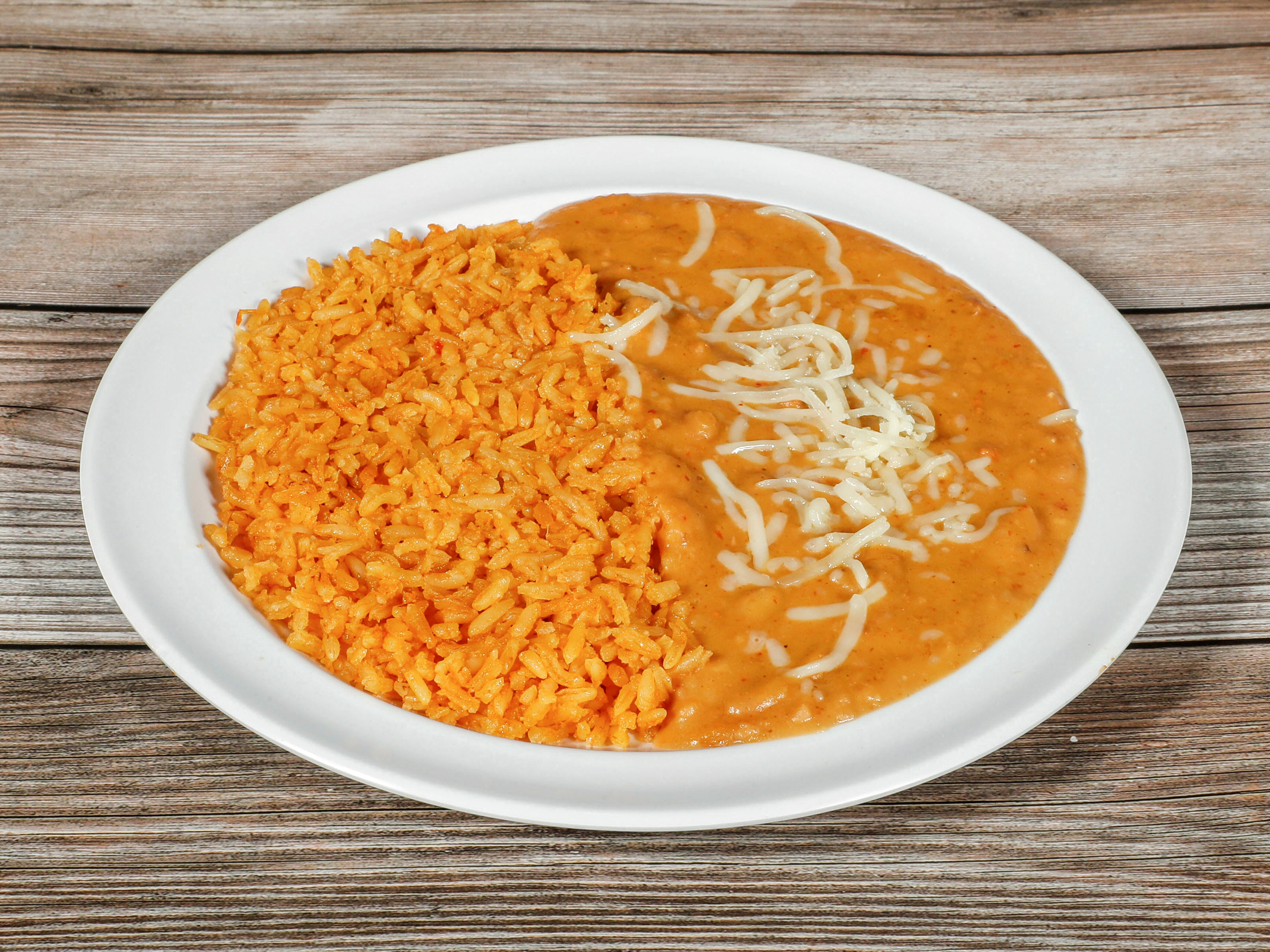 Order Rice and Beans food online from La Perla Taqueria Mexican Grill store, Chico on bringmethat.com