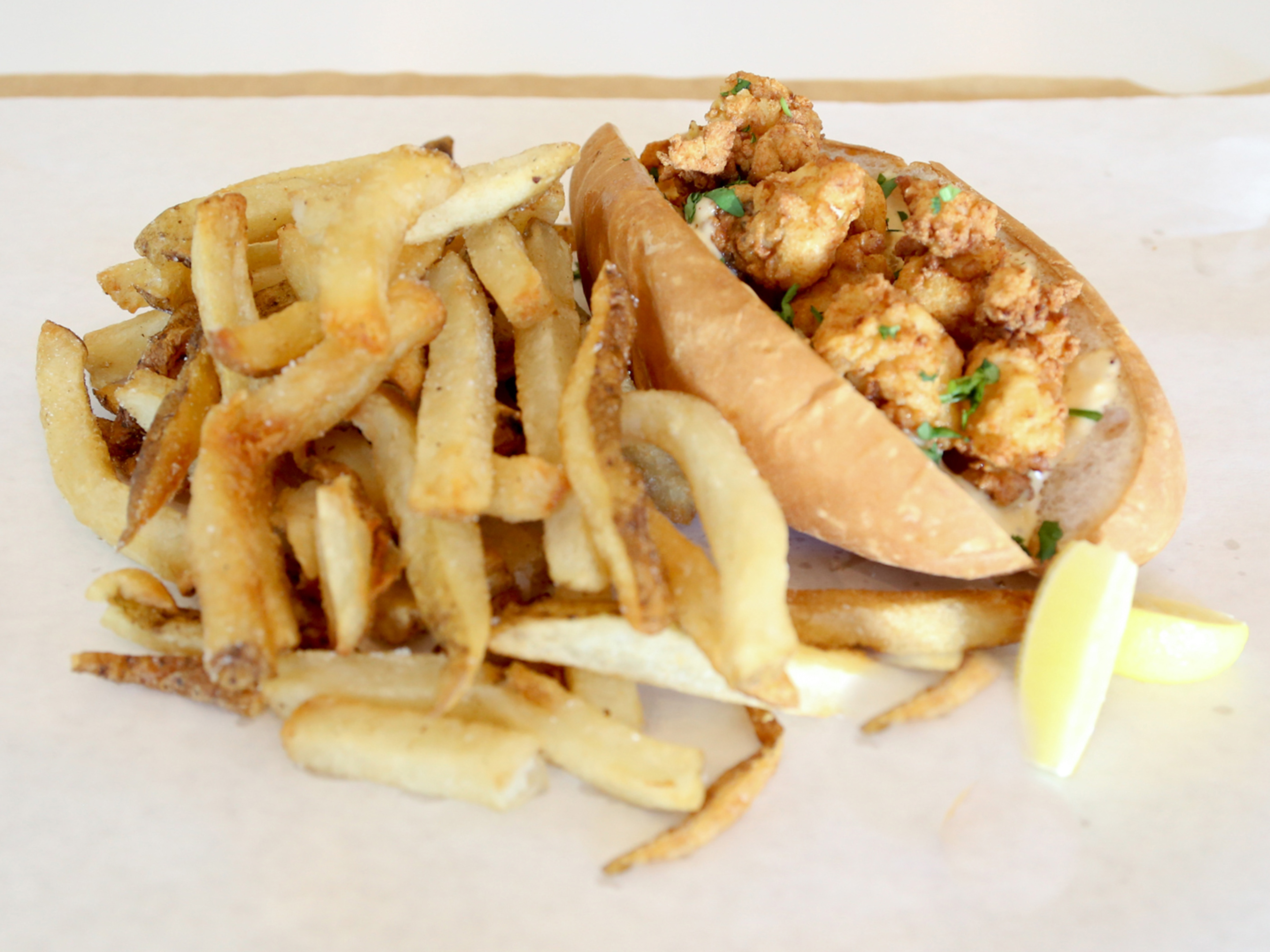 Order Fried Lobster Poboy Sandwich food online from Fat Boy Pantry store, New Orleans on bringmethat.com