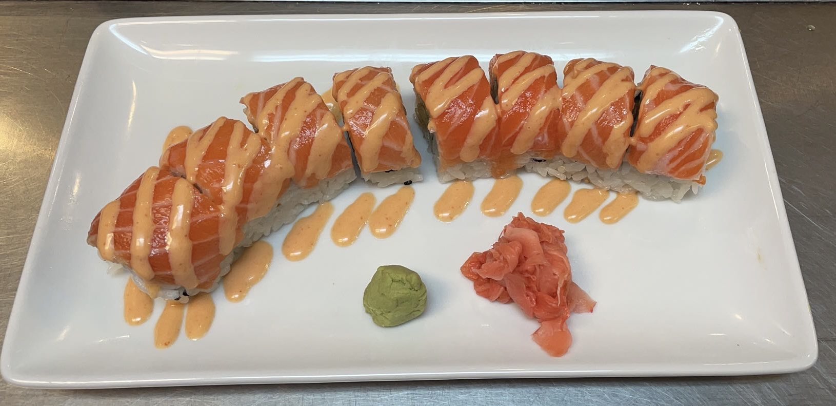 Order Salmon Lover Roll food online from Extreme Teriyaki Grill Express store, Waldorf on bringmethat.com