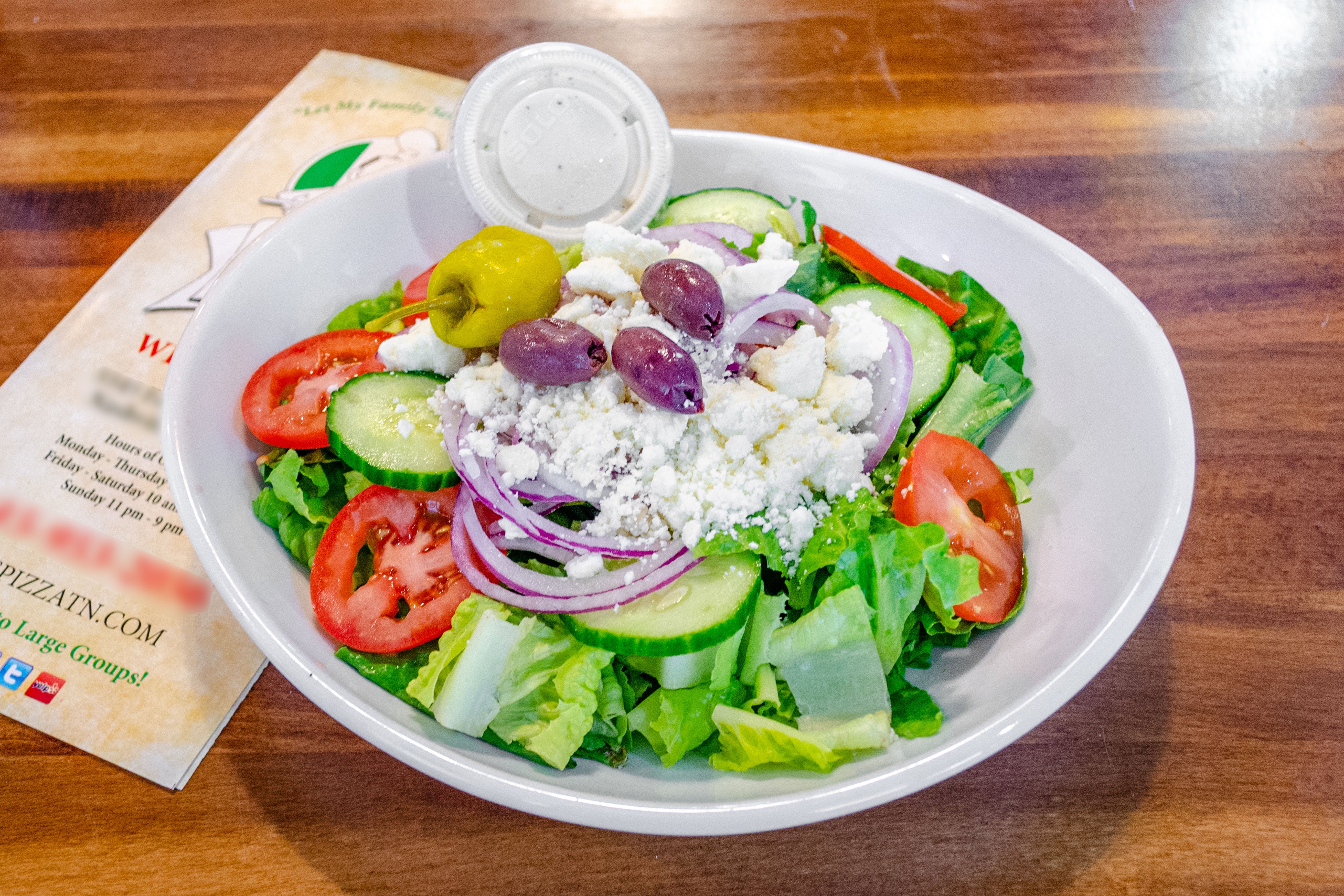 Order Greek Salad - Small food online from Sals Family Pizza store, Nashville on bringmethat.com