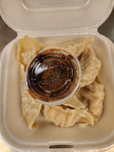 Order 108. Steamed or Fried Dumplings (8) food online from Pearl Chinese Restaurant store, Mesquite on bringmethat.com