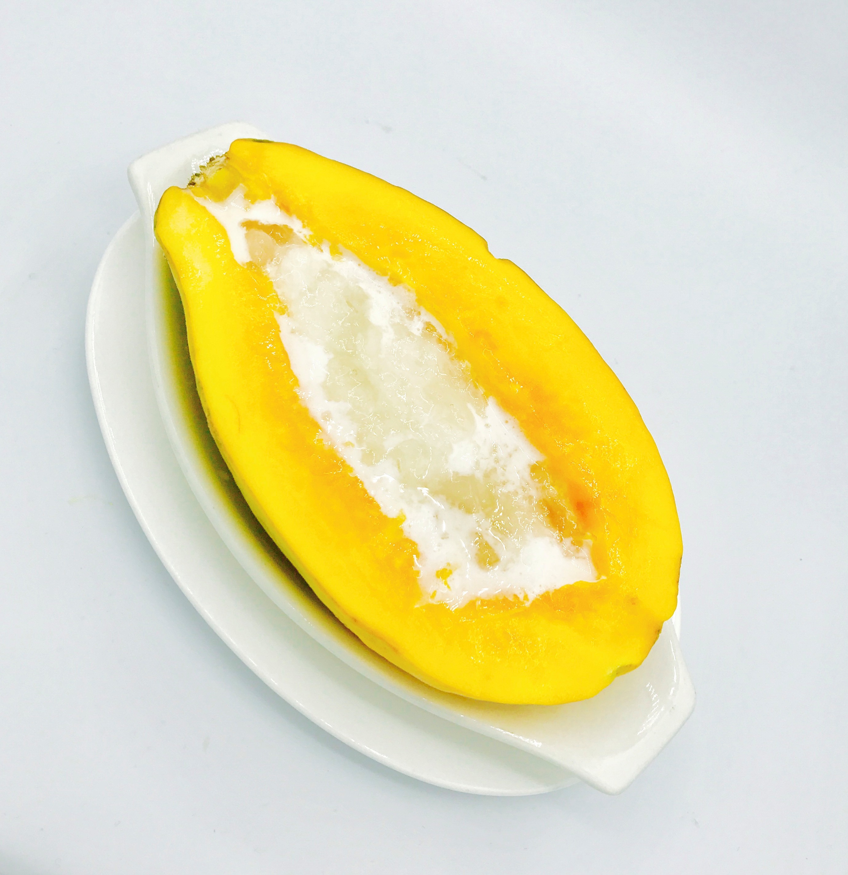 Order #8 Papaya with Crystal Snow food online from Sweet Mango Dessert Cafe store, San Francisco on bringmethat.com