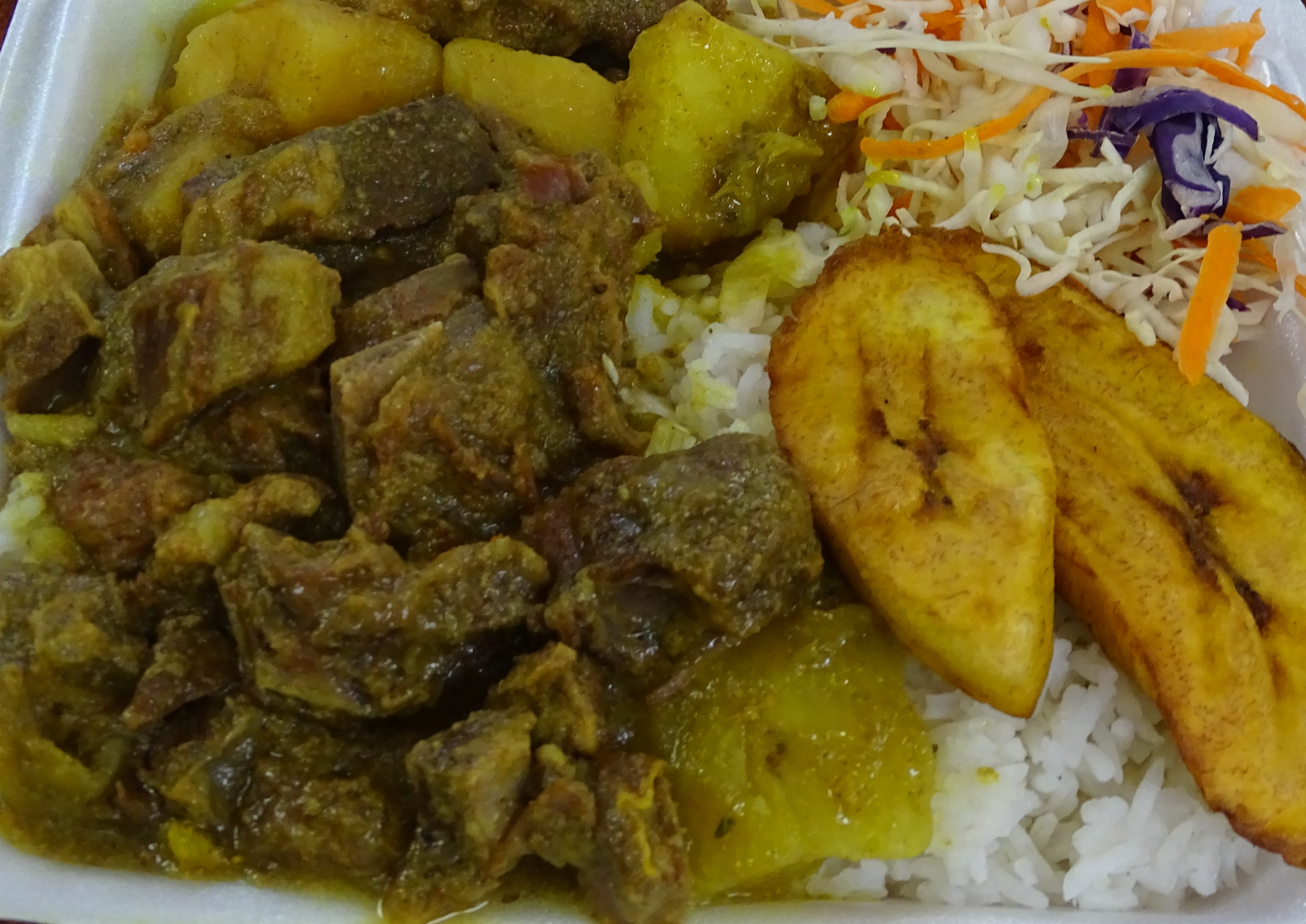 Order  Curry Goat-  Sumptuous food online from Top Taste Jamaican Restaurant store, Florida City on bringmethat.com