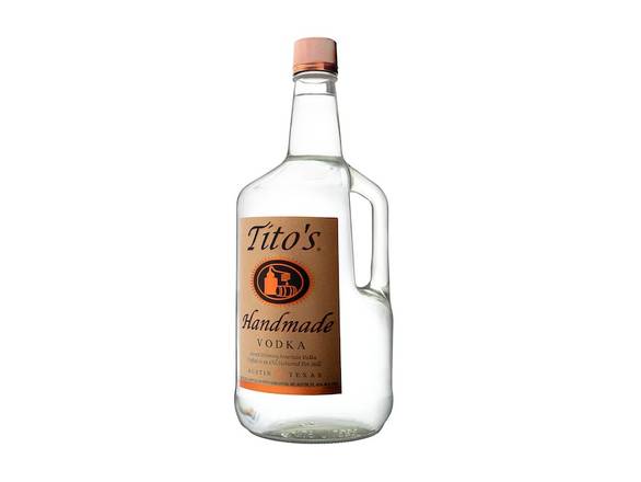 Order Tito's Handmade Vodka - 1.75L Bottle food online from Josh Wines & Liquors Inc store, New York on bringmethat.com