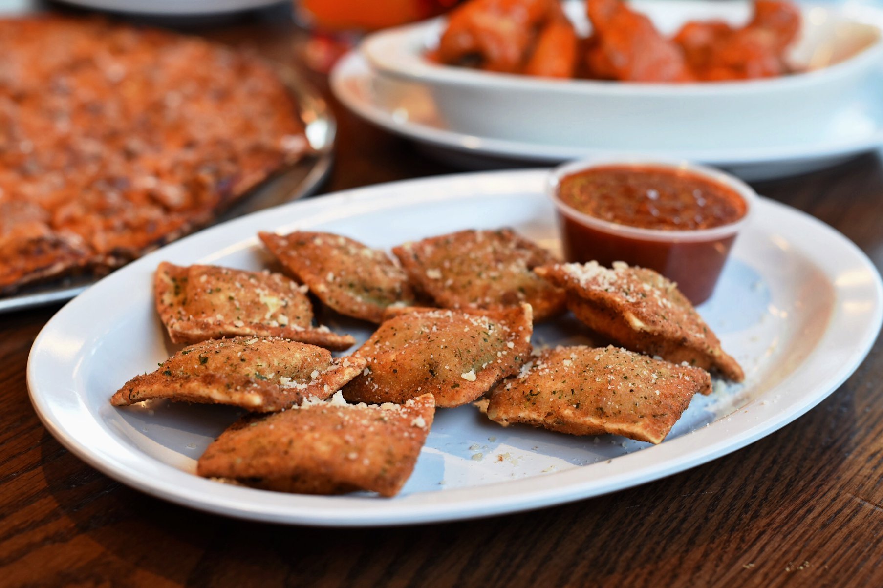 Order Toasted Ravioli food online from Imo's Pizza store, Jefferson City on bringmethat.com