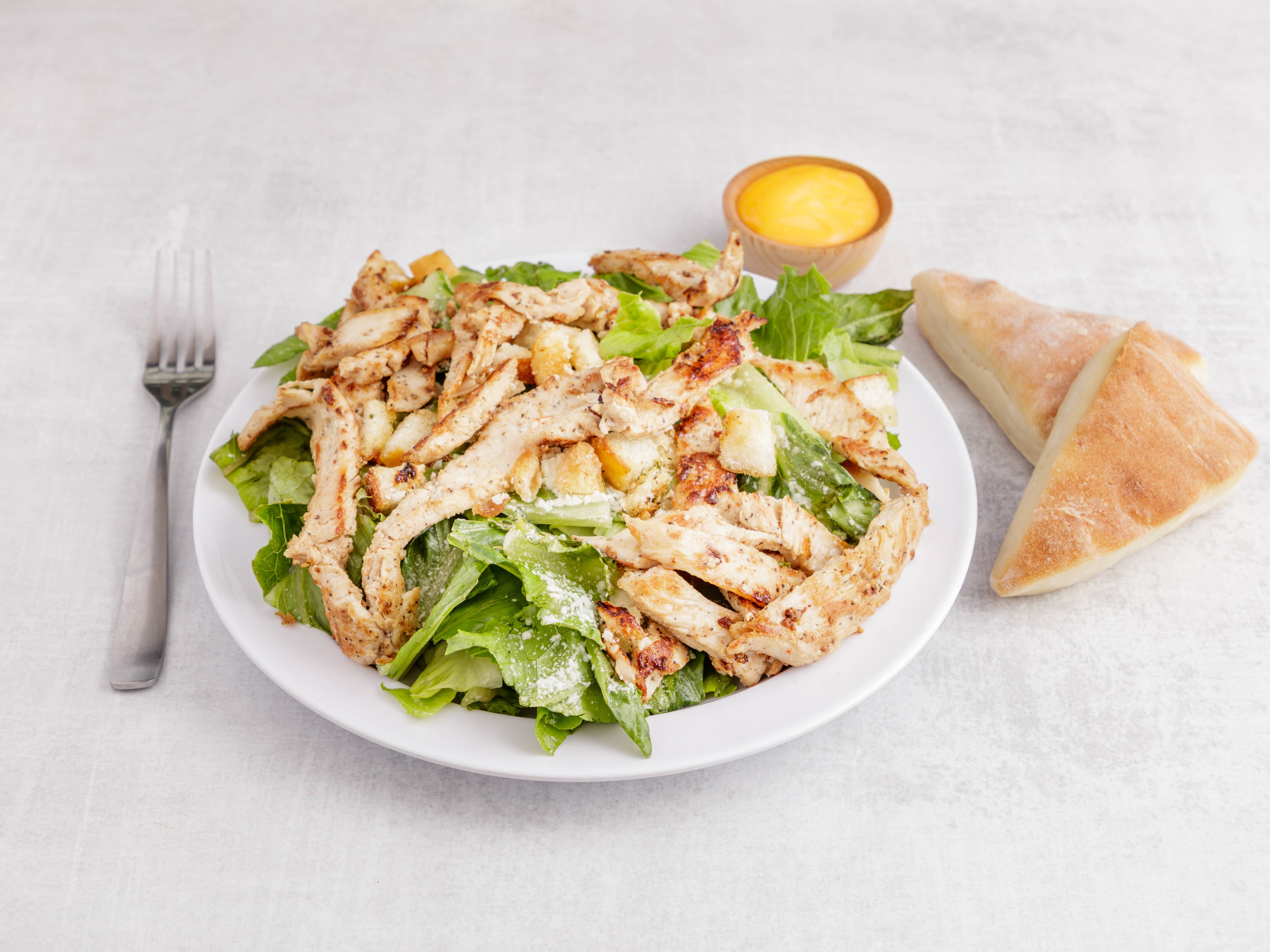 Order Caesar Salad with Chicken food online from Sabrina Pizza & Catering store, East Windsor on bringmethat.com