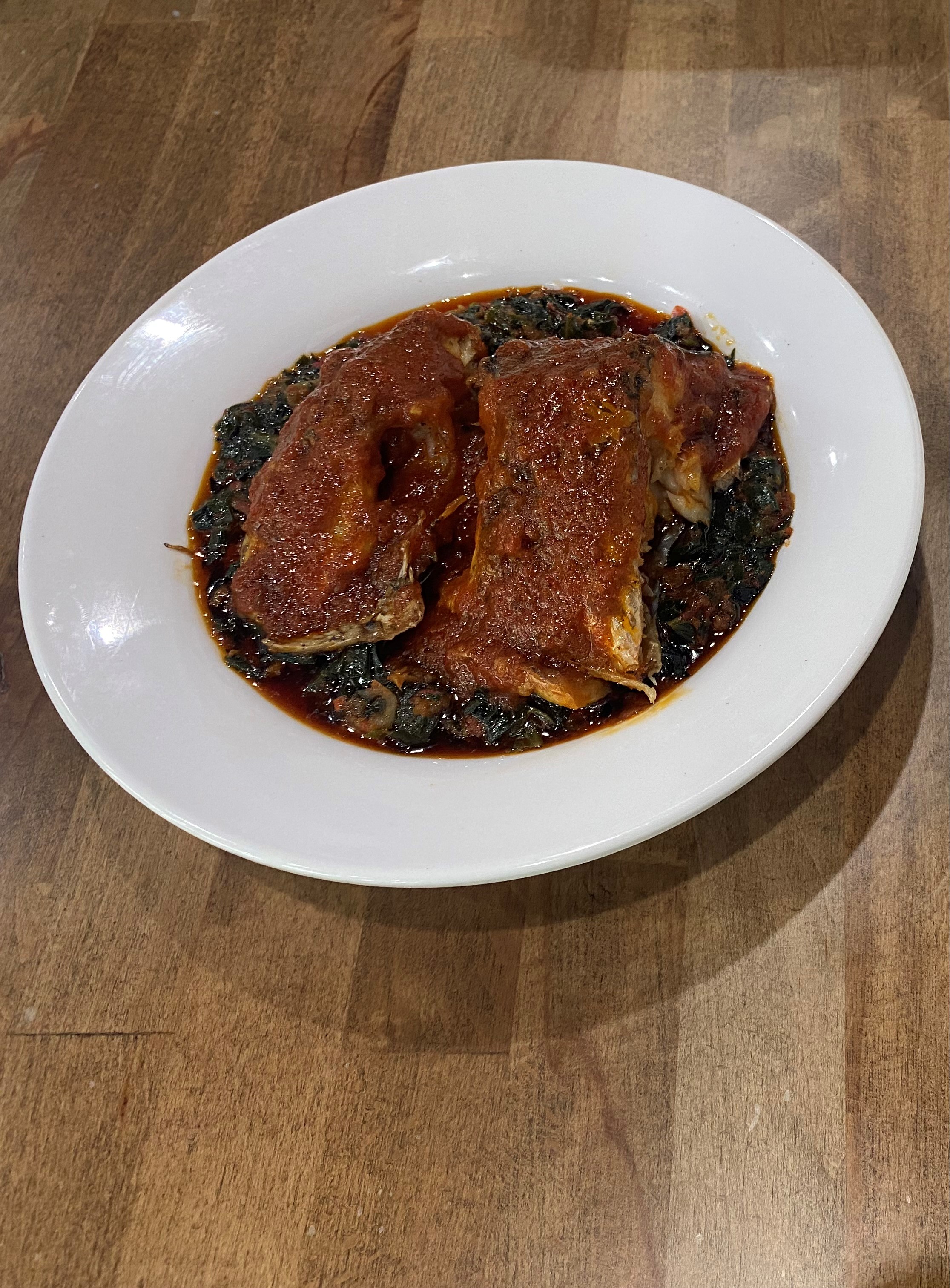 Order Efo Riro-Spinach + Fish food online from Fusion Vibes Kitchen + Bar store, Richardson on bringmethat.com