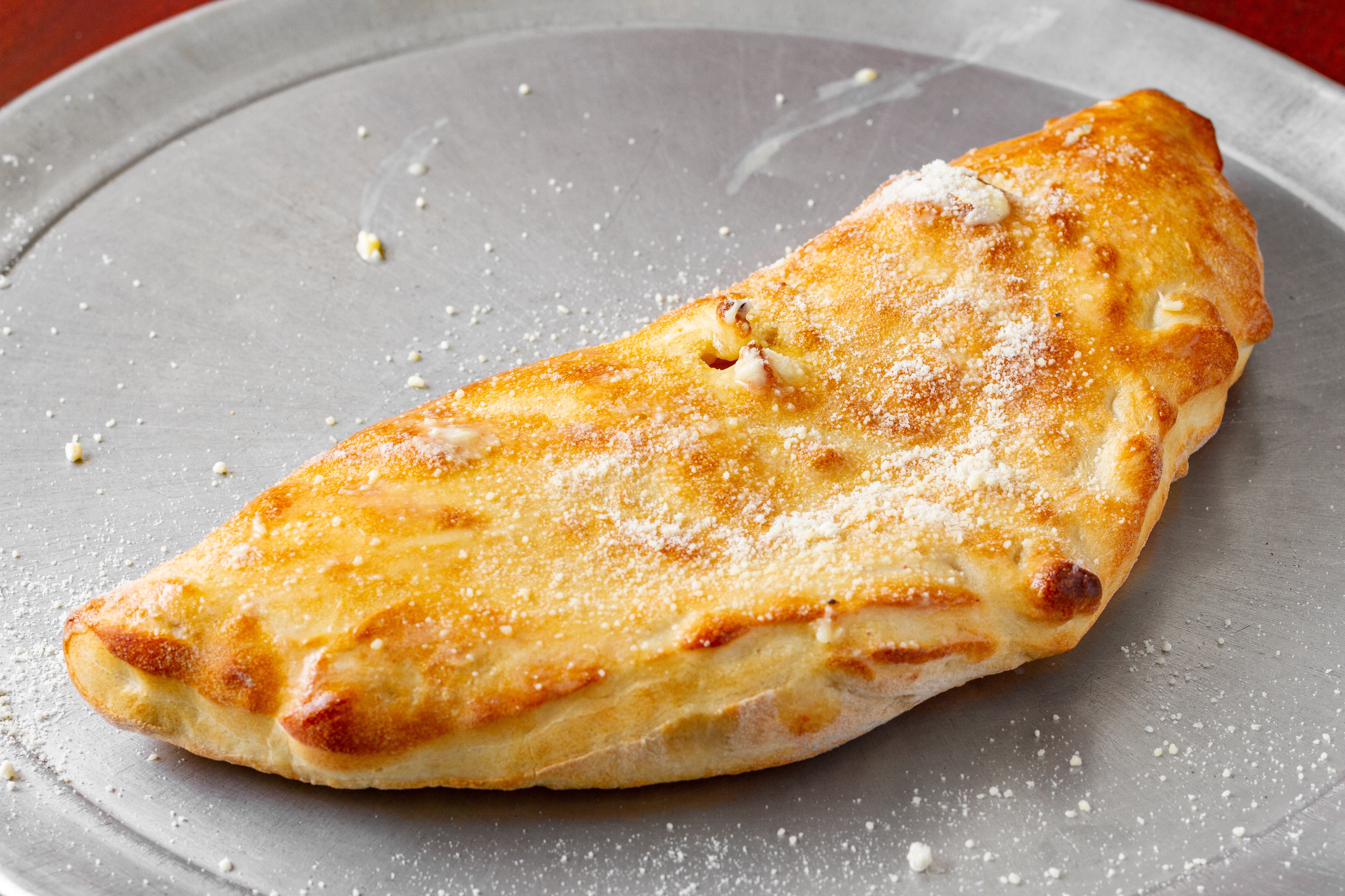 Order Cheese Stromboli - Medium food online from G's Pizzeria store, Elkton on bringmethat.com