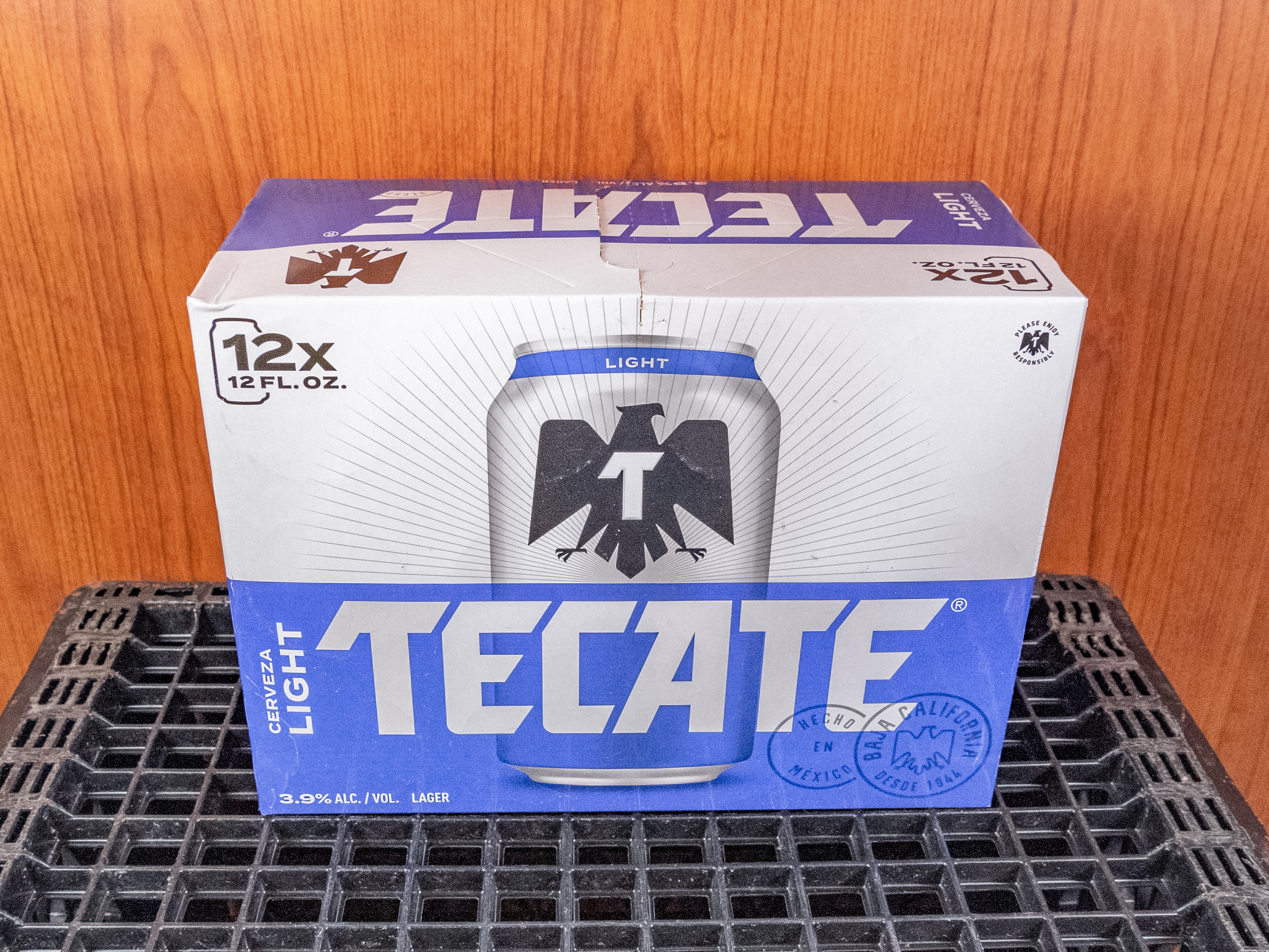 Order Tecate Light, 12 fl. oz. Can - 12 Pack food online from Speedway Liquor store, Mesa on bringmethat.com