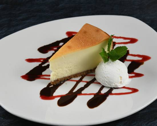 Order Cheesecake food online from Rainforest Cafe store, Nashville on bringmethat.com