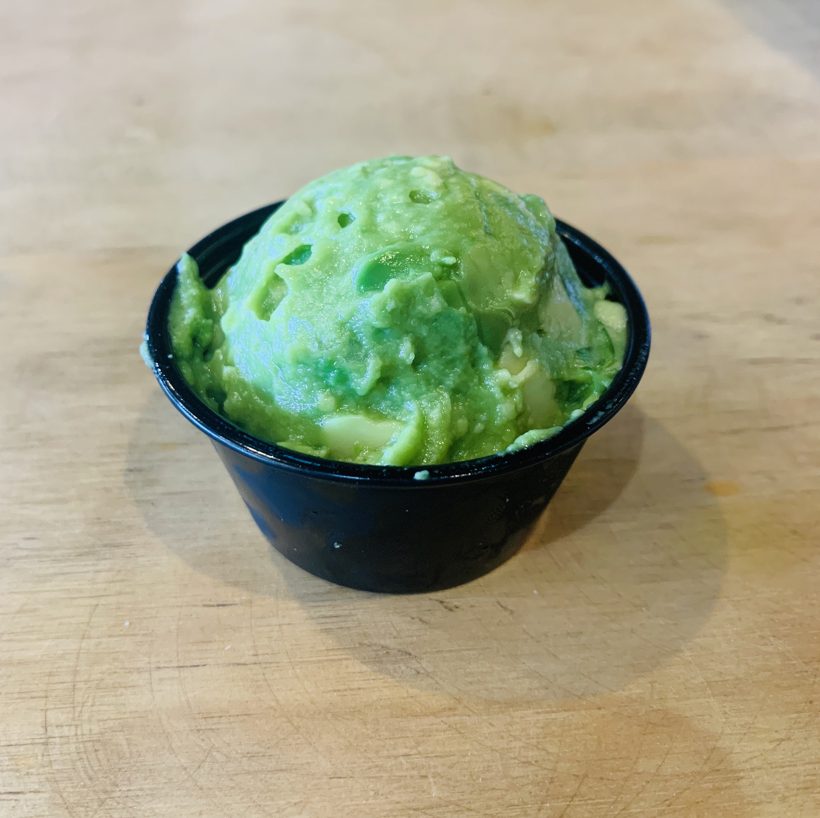 Order Side of Guacamole food online from Adrian`s Tacos California store, Katy on bringmethat.com