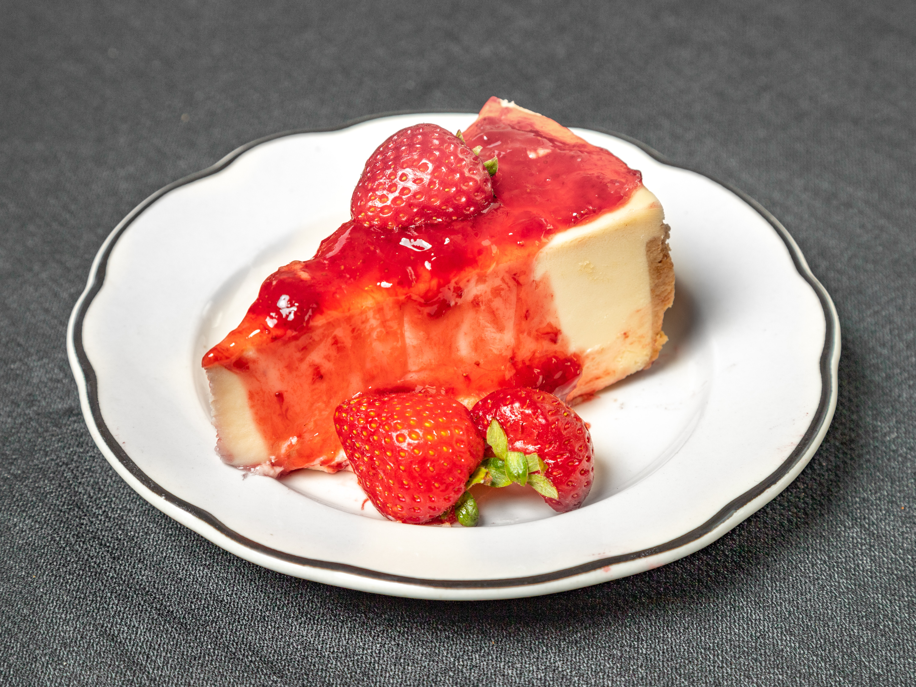 Order Cheesecake with Strawberry Topping food online from Oliveiras Peabody store, Peabody on bringmethat.com