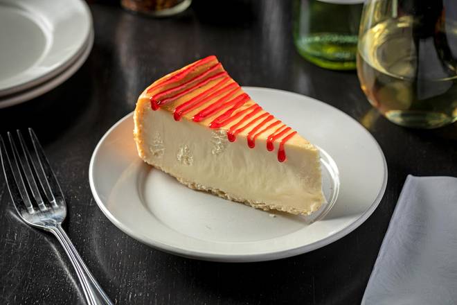 Order Cheesecake with Strawberry Syrup food online from The Pasta Bowl store, Chicago on bringmethat.com