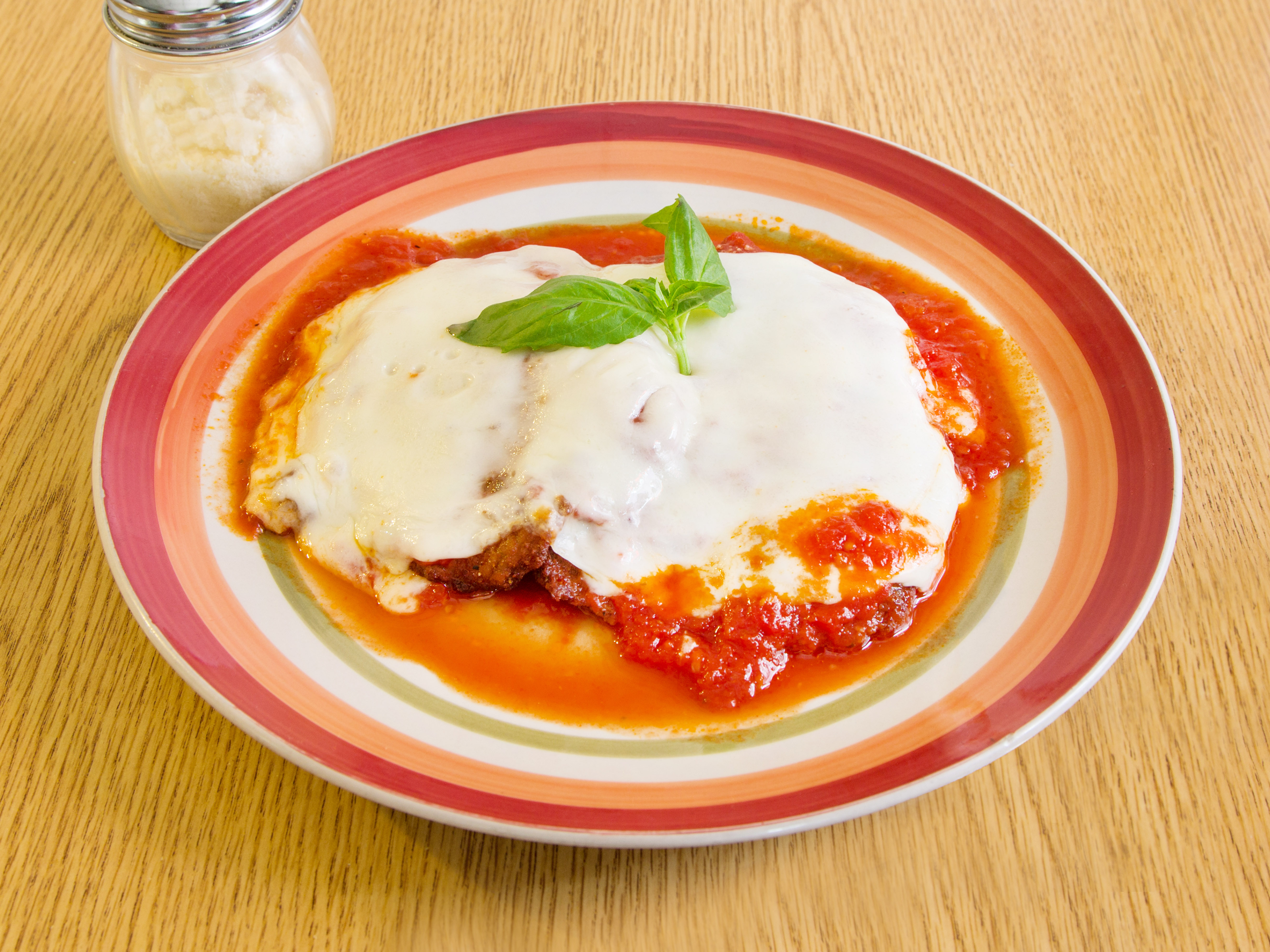 Order Chicken Parmigiana food online from New Pizza On the Block store, West New York on bringmethat.com
