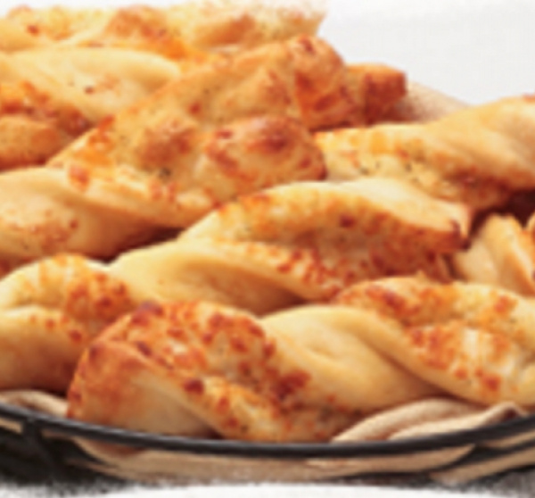 Order Garlic Parmesan Twists food online from Round Table Pizza store, San Francisco on bringmethat.com