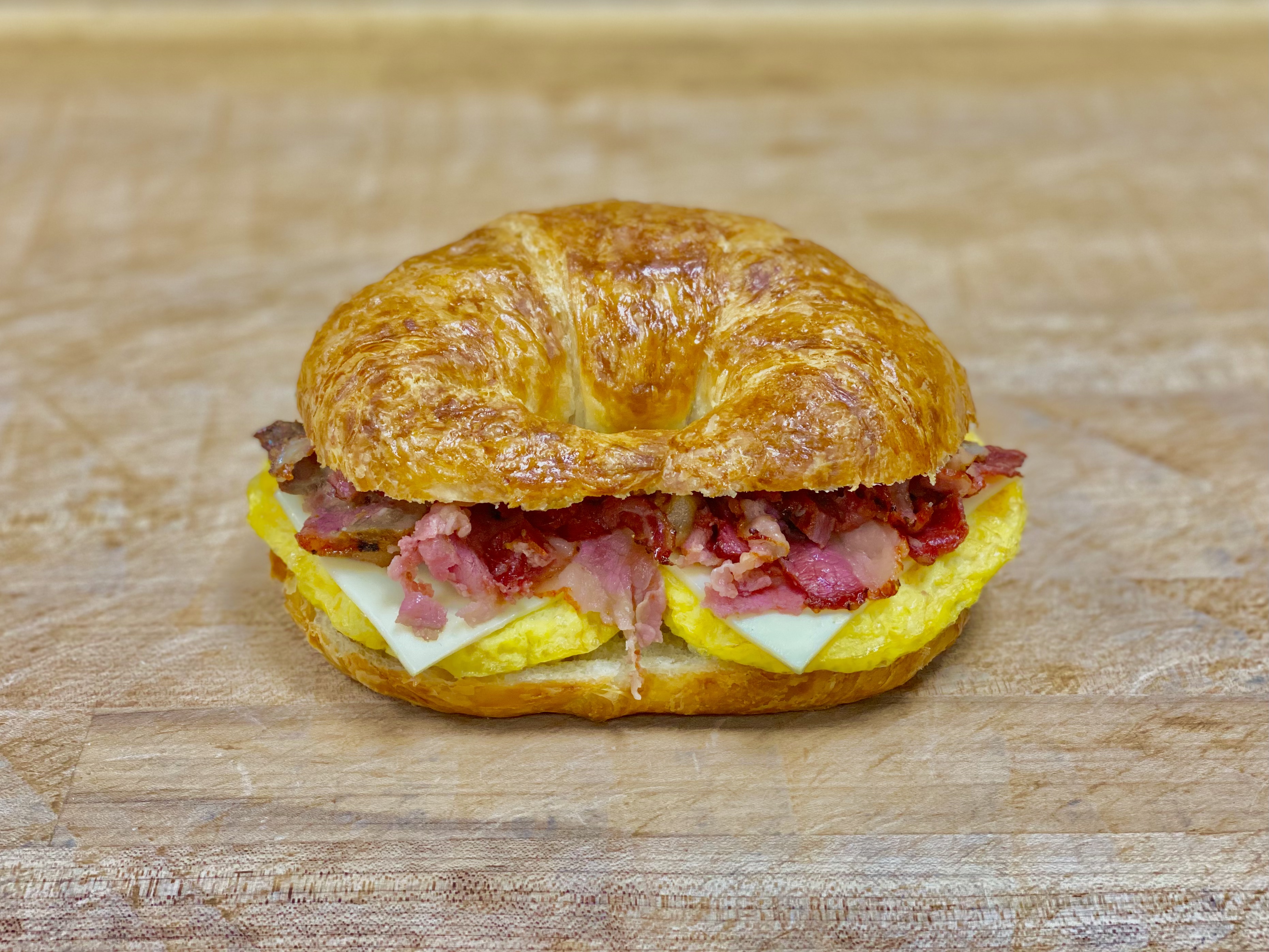 Order B-21 Pastrami & Egg & Cheese Croissant food online from K-Inn Donuts store, Paramount on bringmethat.com
