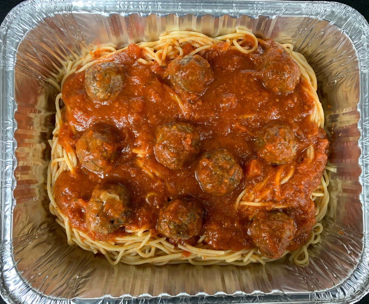 Order Spaghetti con Albóndigas Grande / Spaghetti with Meatballs Large food online from La estrella del castillo store, Brooklyn on bringmethat.com