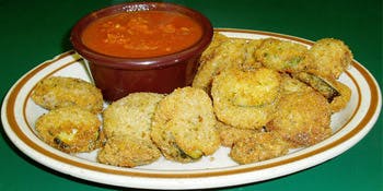 Order Fried Zucchini - Appetizer food online from Primas Pasta & Pizza Restaurant store, Fort Worth on bringmethat.com