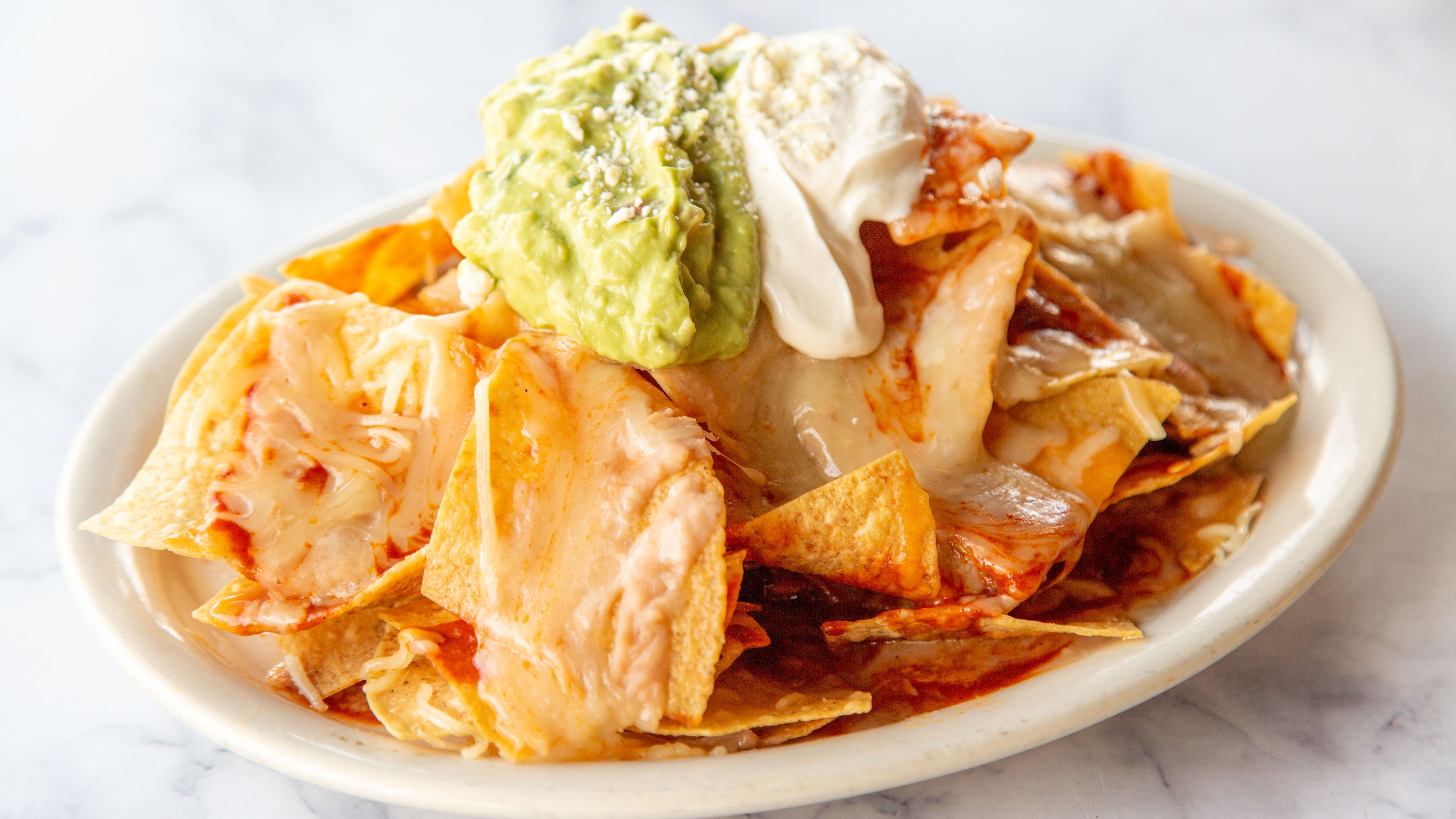 Order Cheese Nachos food online from Melody Mexican Kitchen store, Reseda on bringmethat.com